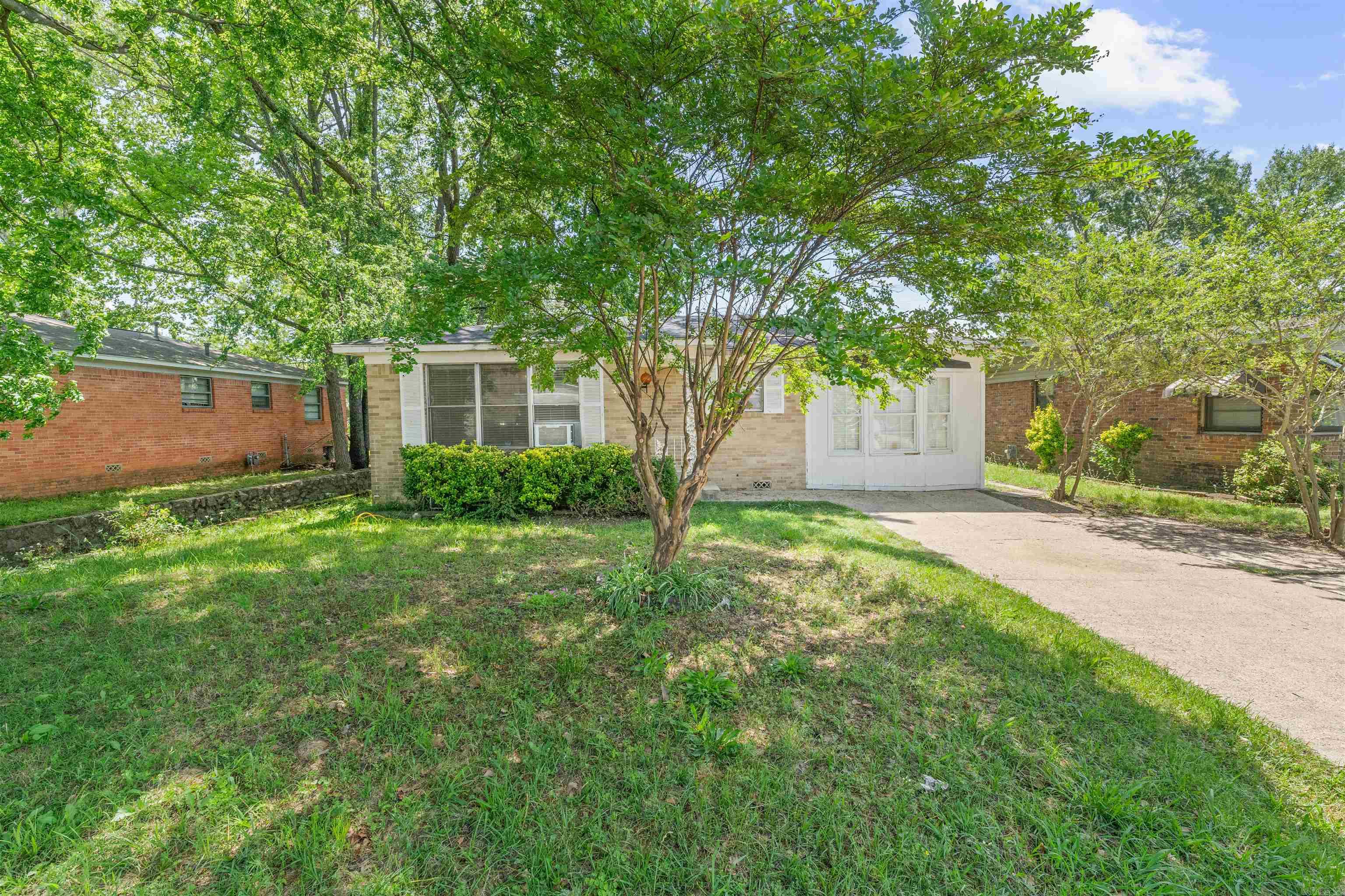 Move-in ready. There are 3 bedrooms, 2 bathrooms and original hardwood floors. The carport was closed in and would make a wonderful man cave, office, playroom or 4th bedroom. The roof is new. This home is perfect for a student at UALR, first-time home buyer or investment property. Call today for a showing.
