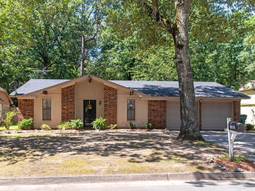 You have to see this gorgeous, most charming home in the beautiful subdivision of Indian Hills in Pine Bluff. This home is close to everything including restaurants, shopping, schools, and interstate. This home is situated on a huge lot in a very desirable neighborhood. It boasts 3 bedrooms, 2 baths, a large great room, separate dining room, plus an eat-in kitchen with a small breakfast nook, and a 2-car garage. While you're touring the property, make sure to check out the cozy fireplace. You will feel at home! Also, all the bedrooms are nice sized bedrooms. A lot of amenities have been updated within the last nine years including new LVP flooring in living & dining area, new carpet in the bedrooms, paint, refurbished fireplace, updated baths, new lighting, and the list goes on and on. The large backyard is plenty of room for family gatherings and for the children & pets to roam and play. Don't let this one get away. Don't delay! Call for your personal tour today!