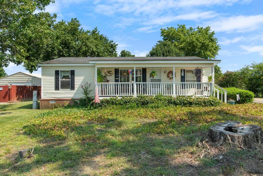 ***Back on Market. No Fault of Seller.*** Well maintained home on nearly half an acre located just outside of Conway city limits! This spacious double wide manufactured home on a concrete slab (permanent foundation) offers the desirable open, split floorplan, 3 bedrooms, 2 bathrooms, and 1,240 square feet of living space. The open chef’s kitchen has a gas range and plenty of cabinet’s & counter space. The spacious primary ensuite includes a walk in closet, soaking tub and separate shower. Enjoy relaxing on the covered front porch or on the back deck that overlooks a huge backyard. Owners have made these updates over the years: Roof, luxury vinyl plank (LVP) flooring in living room, replaced carpet in primary bedroom, kitchen backsplash, replaced front two windows with easy to clean windows, lighting, and ceiling fan. Kitchen refrigerator, dryer & storage building included! Schedule a tour today! Agents see remarks.