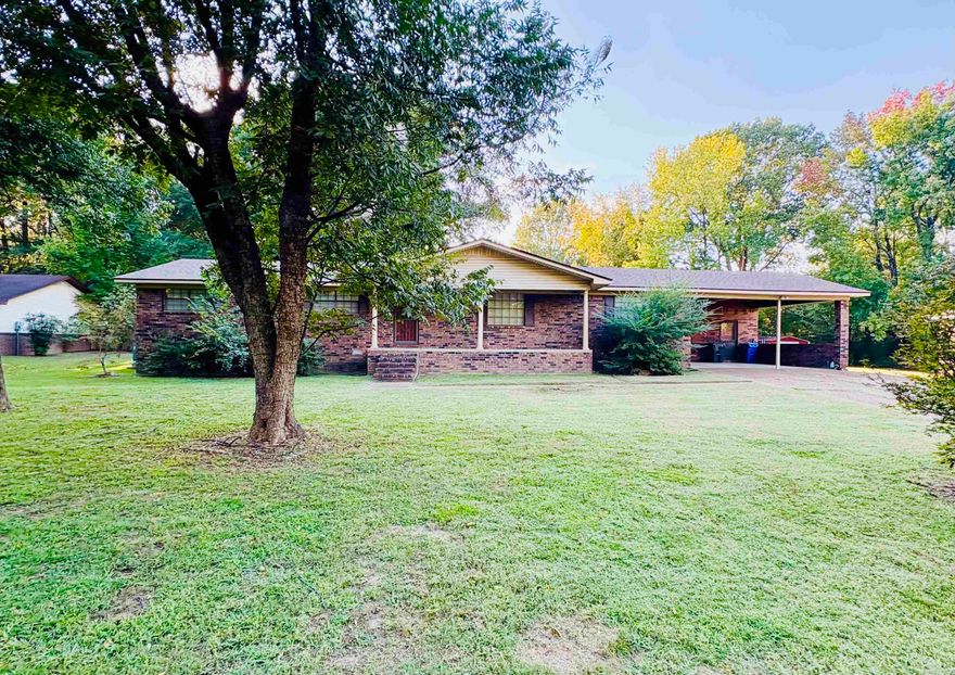 This 4 bedroom, 2 bath home in Jonesboro sits on a quiet, shaded lot and offers plenty of space inside and out. Features include a large living area with a brick fireplace, beautiful wood floors, an updated primary bath with a walk-in tile shower, and a spacious walk-in closet. Out back, you'll find a big yard and a large shop. Perfect for storage, hobbies, or extra parking. This home won't last long! Call today for a private showing!