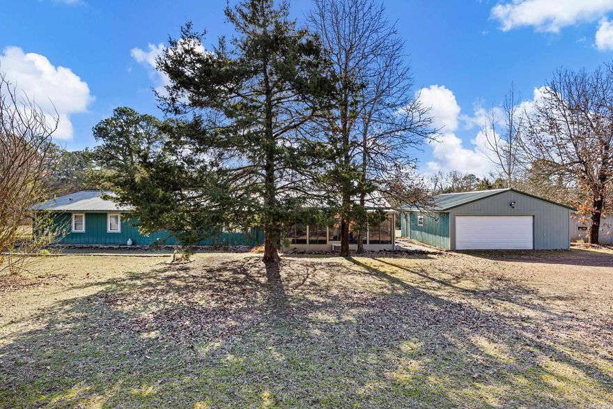 Spacious 4-Bed, 3-Bath Home on 5.27 Acres with TWO new HVAC units, a brand new water heater, Abundant Storage AND you can assume the loan and have an interest rate of only 2.875%!!! Enjoy the perfect blend of comfort and functionality with this 4-bedroom, 3-bathroom home featuring a split floor plan for privacy and flexibility. Set on 5.27 flat, usable acres, this property is ideal for those needing ample space both inside and out. The home boasts a 9' x 22' sunroom, perfect for relaxing or entertaining. Outside, you'll find a two-car detached garage, a large covered three-stall storage shed, an 11'9'' x 12'3'' greenhouse, and even a wood chipper to maintain the expansive property. With room to spread out, work, and store all your tools and toys, this property is a must-see!