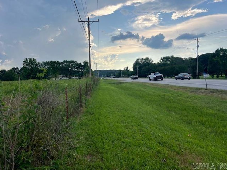 13.70 COMMERCIAL ACRES on U.S. Highway 69 also known as Harrison Street. Approximately 370' highway frontage. Already has an established entrance drive, 6'' city water line, 3 phase power along the front. This land is mostly level and is an excellent location for most any business ventures in the East area where Batesville is growing rapidly. Established commercial businesses already encompass that area so the time is NOW to buy this nice sized lot because there won't be a second chance.