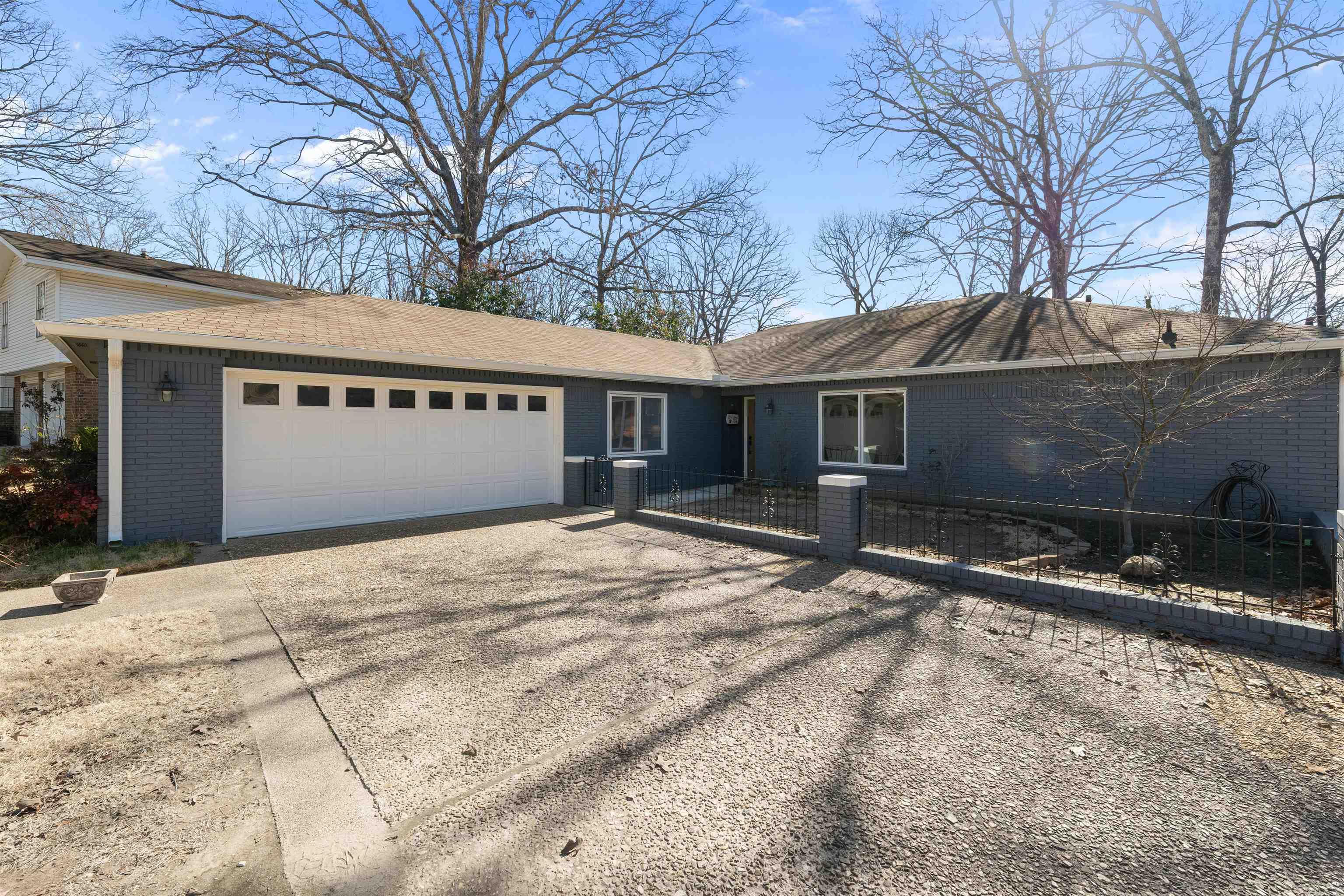 Wait until you see this one! Completely remodeled inside. As you enter you are greeted with an open floor plan. The kitchen is open to the living area and there are 2 French doors that open to the backyard. The kitchen has granite countertops, stainless steel appliances and new cabinetry. The great room has a vaulted ceiling which makes it feel even larger. There is new paint, new windows, new lighting and LVP flooring throughout. The primary bedroom has a beautiful ensuite. There is a tiled shower and tall vanity with a large walk-in closet. Both guest bedrooms have French doors to the backyard. One of the guest bedrooms has access to the hall bath which is perfect for guest. Call today for a showing.