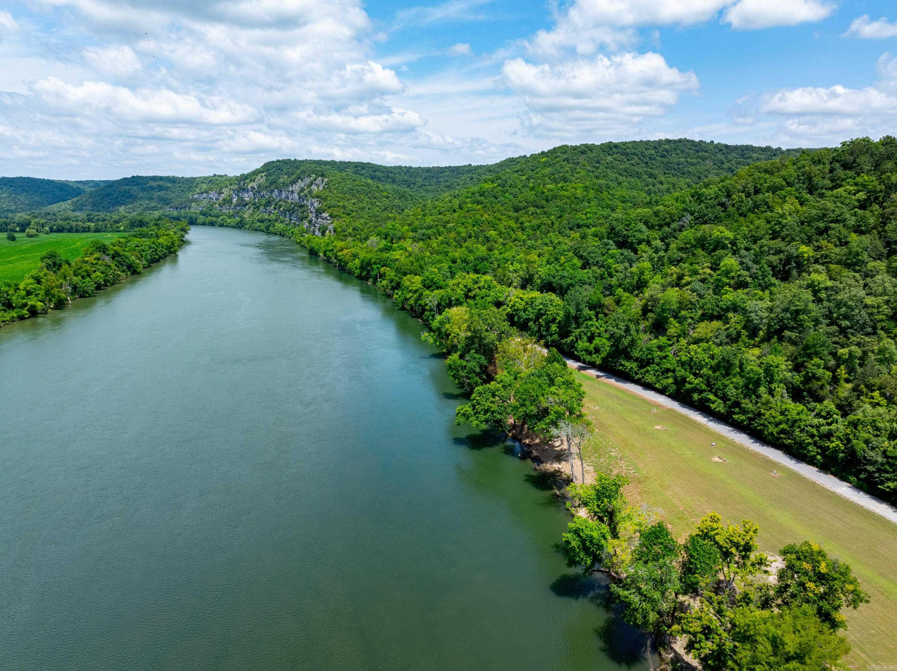 Welcome to your own slice of WATERFRONT HEAVEN! Nestled in the heart of the Ozark Mountains, Lots 1 & 2 in the Collietown Subdivision present an extraordinary opportunity to own over 1 acre of pristine beauty that defines this remarkable region. With approximately half an acre of meticulously manicured land, these lots slope gently from the road down to the breathtaking White River, offering the perfect setting for your dream home. Located just 30 minutes from White River Medical Hospital in Batesville, this property combines the peace of rural living with convenient access to essential amenities. Whether you're seeking a year-round retreat or a primary residence, these lots are ready for your vision.These lots offer a rare chance to own a piece of the Ozarks, where the beauty of the mountains meets the tranquility of the river. Whether you're planning to build a permanent residence, a vacation getaway, or simply invest in prime real estate, Lots 1 & 2 of the Collietown Subdivision provide everything you need for a fulfilling and peaceful lifestyle. Plus, the seller offers custom-built homes, giving you even more flexibility and options!