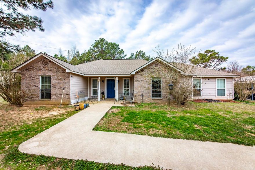 Tucked away on 10 mostly wooded acres, this 3 bed, 2 bath home offers privacy, space, and room to breathe—just 3 miles from the Greers Ferry Lake boat ramp. The large living room flows right into the kitchen with breakfast area and walk-in pantry, making it perfect for everyday living and entertaining. A formal dining room could easily serve as a home office. The primary suite features a walk-in shower, soaker tub, and oversized closet. Outside, enjoy the peaceful setting from the large patio with pergola. Property includes another future homesite setup or RV setup with electric, water, and septic, plus a shed/barn for equipment, storage container, and two metal carports. Country living with lake convenience!