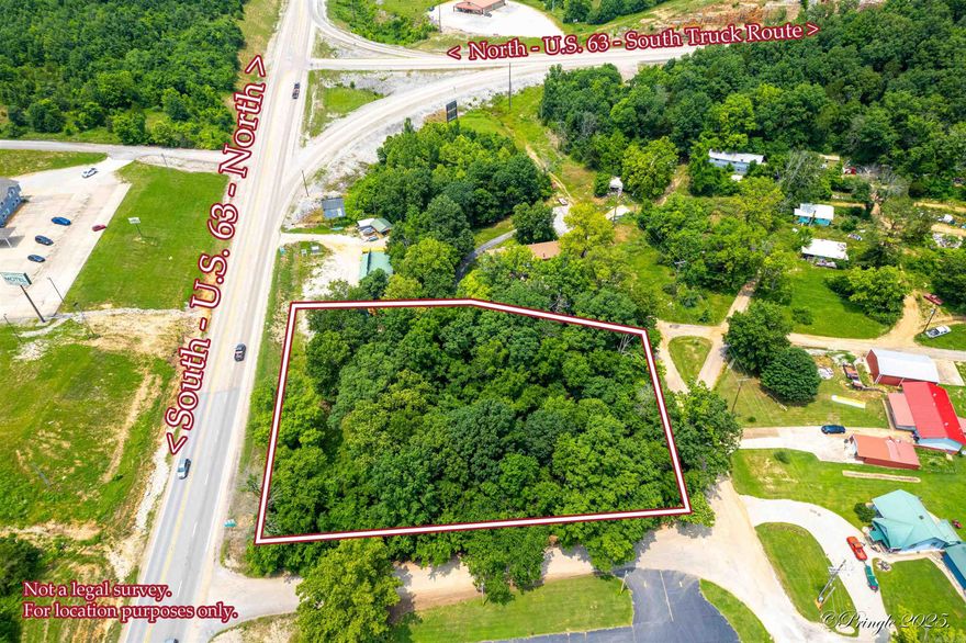 Excellent commercial potential on this 1.5 acres M/L, featuring over 200' of Highway 63 frontage as well as city streets on two additional sides for great access and visibility. This property is mostly wooded but has tons of potential uses in a prime location!
