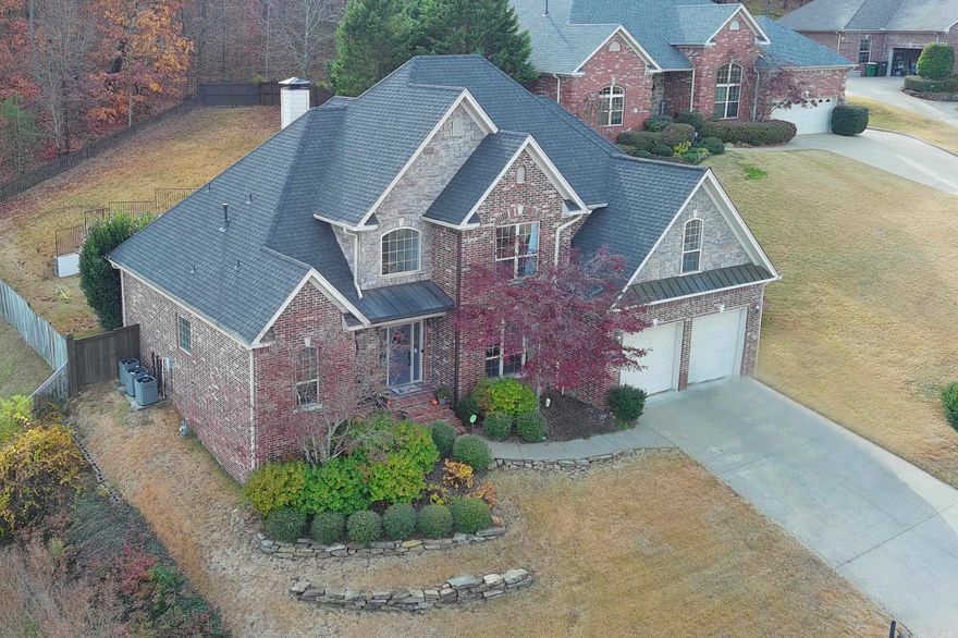 Discover elegance and comfort in this stately home, nestled on a quiet cul-de-sac in the prestigious Chenal Valley. Primary suites on the main and upper level, 3 other big bedrooms upstairs. Upper Primary Bedroom makes a great Game or Theater room. Thoughtfully updated throughout with paint, flooring, and many other upgrades. The heart of the home is the expansive kitchen with a large island, tons of cabinets, separate pantry, and generous sitting area - all accentuated by floor-to-ceiling windows that flood the space with natural light. Gorgeous PRIVATE backyard! The comfy Veranda begs you to relax and enjoy the peaceful surroundings. The seating area, with a GAS fire pit, for intimate gatherings or simply unwinding under the stars awaits. Agents see all remarks.