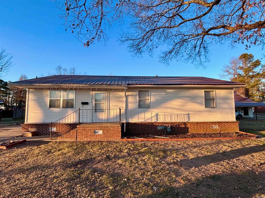 Welcome home to this charming corner-lot gem just minutes from Walnut Ridge School. Offering 3 bedrooms and 1 bath across 1,276 sq ft, this home feels warm and welcoming from the start. This home has a durable metal roof and storm doors and the cute front porch invites you to sit and stay awhile, while a separate side entry adds everyday convenience! Outside, the spacious side yard offers room to relax, play, or garden, with nice-sized parking pads for easy access. A home full of charm, space, and great location!