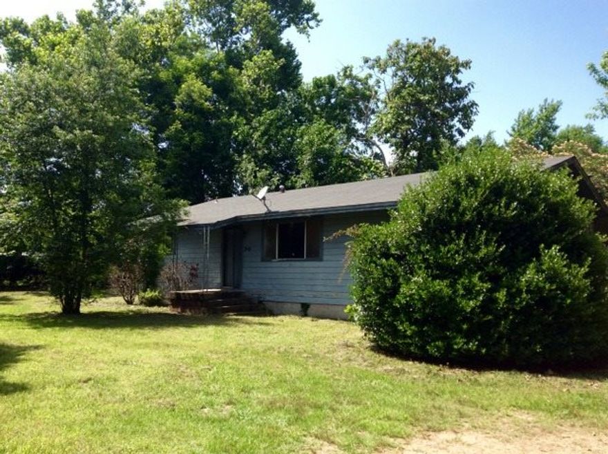 Located centrally only blocks from shopping, post office and next door to the County Health Department. 1344 Sq. Ft., 3 bedrooms and 1 bath, with floors of carpet, wood, and vinyl. The kitchen includes a free standing stove and refrigerator w/ice hoop up that stays with the home.