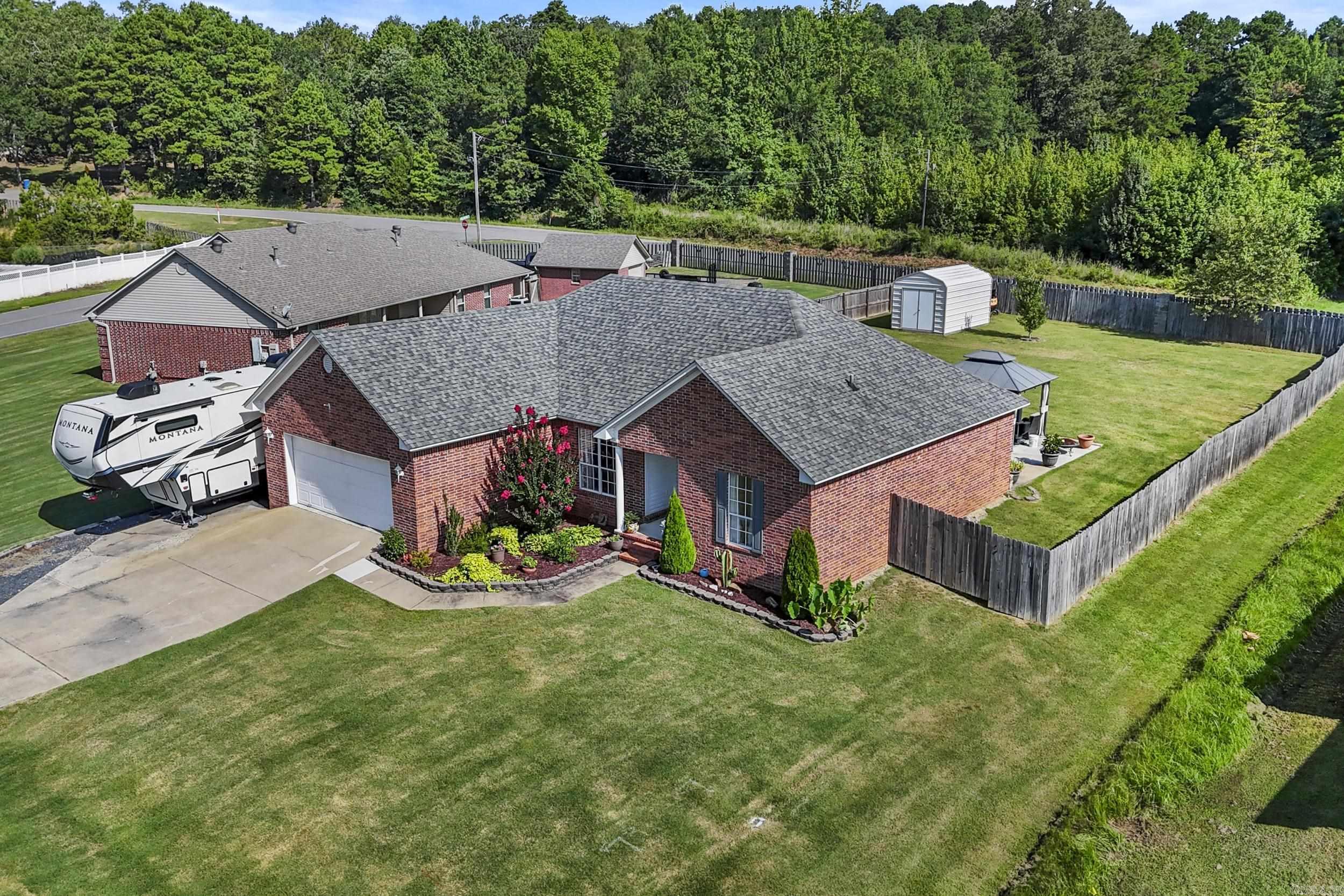 Tucked away in the quiet and private Wilhelmina Cove neighborhood, this charming all-brick home offers a rare mix of comfort and convenience. Enjoy exclusive access to a neighborhood boat ramp and a pavilion by the waterāperfect for weekend getaways without ever leaving home. With easy access to the interstate, commuting is a breeze. Major updates include a new roof and HVAC in 2019, and a brand-new water heater in 2024. Inside, youāll find an open floor plan with gorgeous stained concrete and wood floors, a cozy gas log fireplace, and plenty of natural light. The kitchen features a sunny breakfast nook and a separate formal dining area for entertaining. The home also includes a double car garage, a shaded pergola over the back patio, and a school bus stop conveniently located on the corner. Donāt miss your chance to own in this hidden gem of a neighborhoodāschedule your private tour today!