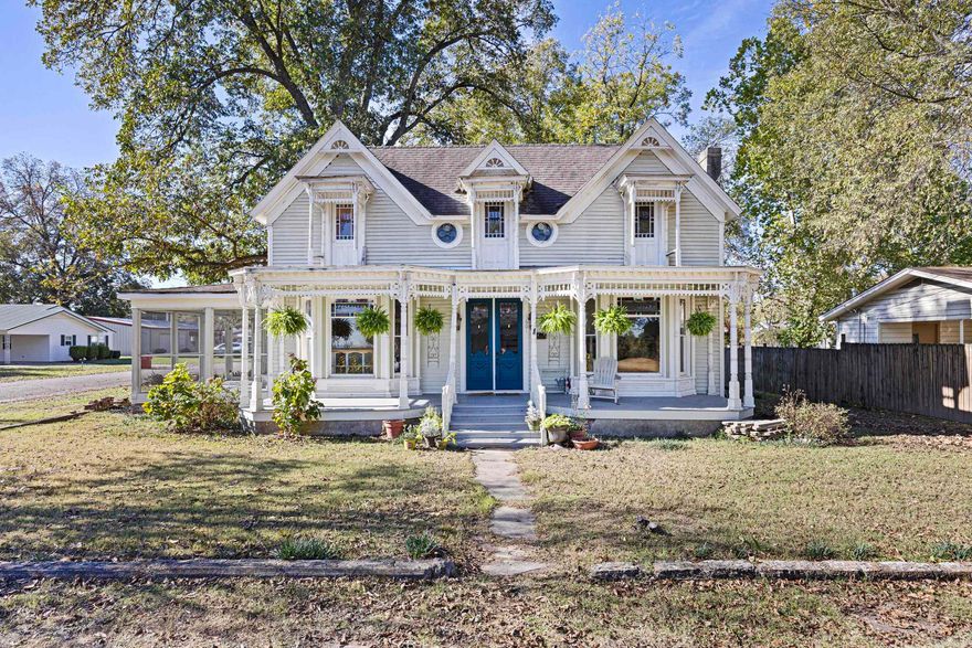 Welcome to this stunning historical home, nestled in the heart of Dardanelle! Overflowing with classic charm and timeless appeal, this 3- (possibly 4-) bedroom, 2-bath gem captures the beauty of days gone by, with rich architectural accents and warm, inviting spaces throughout. The spacious layout includes and a cozy fireplace perfect for chilly evenings, a formal dining room ideal for hosting gatherings, and beautifully preserved wood details that add a touch of elegance in every room. The two-car garage provides ample storage and convenience, while a backyard offers a serene escape for outdoor relaxation. This unique property is a rare find for those who appreciate the beauty and character of a historical home with the comforts of modern living.