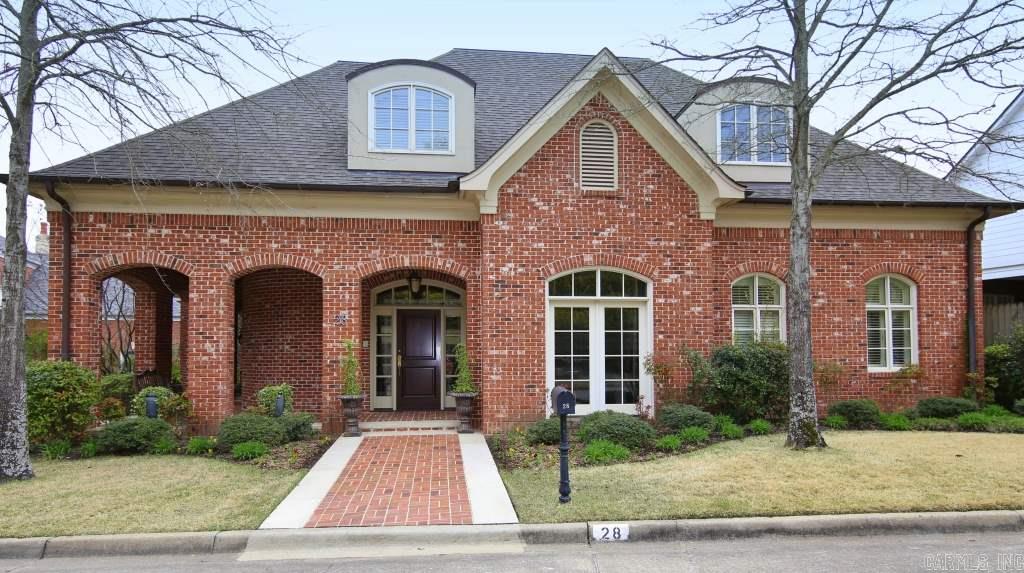 Exceptional custom built home in private neighborhood. Beautiful design by Rodney Parham and built by Wayne Moore. Features include a desirable open floor plan with outstanding kitchen with large island, breakfast bar, wet bar, double ovens, 6 burner gas stove and incredible storage. Beautiful study and master suite with his/hers bathrooms and closets on the main level. Additional bedroom suites, sitting room and workout space, upstairs. Generator, too! Call to see today, prefer 24 hr notice.