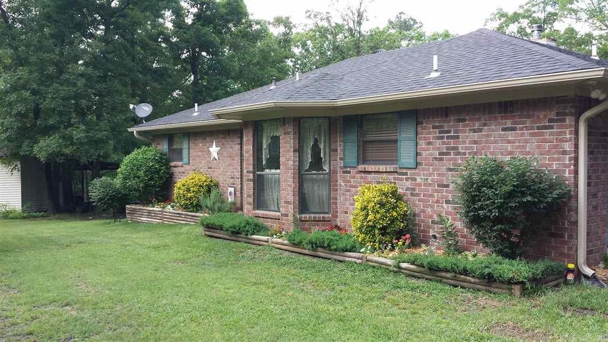 Newly updated home on 5 private acres. Backyard fenced for pets. Wooden deck wraps around back. 2 Breakfast bars, eat-in area, new smooth surface cooktop, double ovens. Open floor plan allows views of stone fireplace from den & kitchen. Built-ins, new tile flooring, new bath vanities, new showers enclosed in both master and guest baths. New architectural roof Nov 2014. Warm, cozy and private- A MUST SEE!