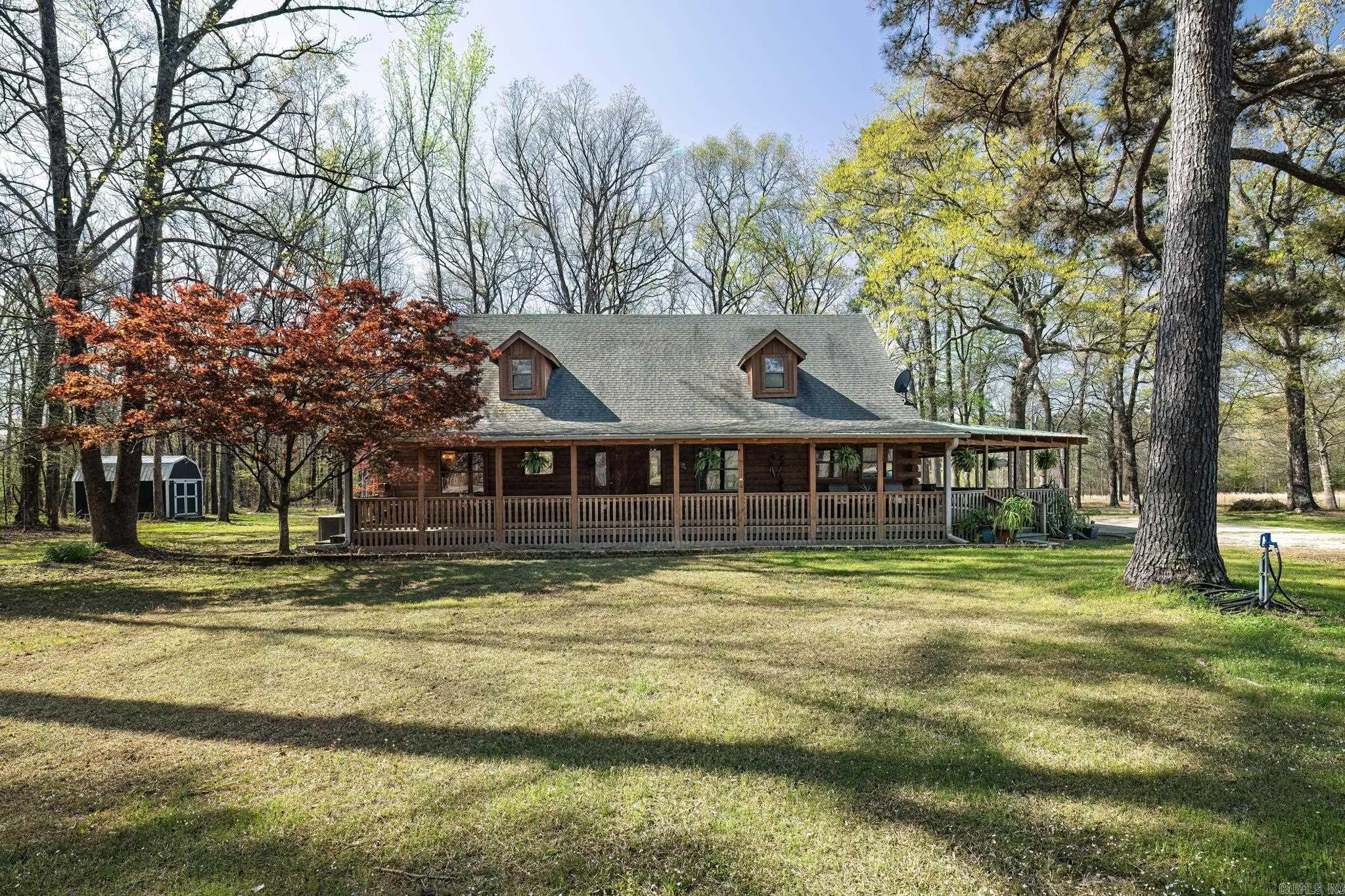 Home is located within walking distance to Glen Rose School. Less than 1 mile to the interstate for an easy commute to the metro area. 15 minutes to the new Buccee's and less than 30 minutes to the Little Rock Airport! Nestled in the heart of nature, this stunning log home offers the perfect blend of rustic charm and modern comforts. Set on a sprawling 20 acres the property has a year around creek.