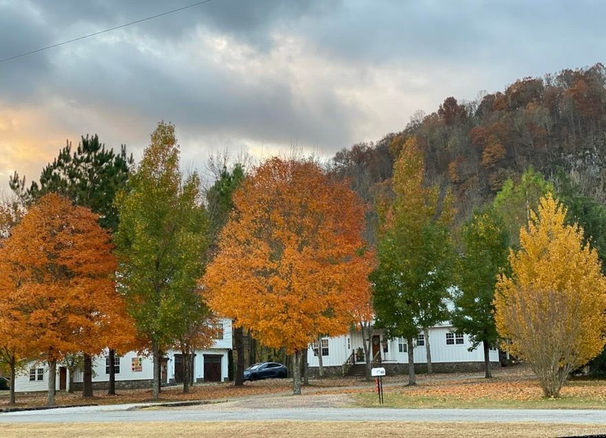 Two yes two fully furnished homes including outdoor items for gatherings and water activities available on the White River, each offering beautiful river frontage on a spacious 1.62 acres m/l with the homes and added are 2 lots across from the houses at 1.85 acres m/l for a total of 3.47 acres m/l. Both properties feature upper and lower decks, providing amble outdoor living space. The lower deck is constructed of laid rocks with a large fireplace, perfect for gatherings or just some serene time in nature. Enjoy breathtaking views from both houses, creating an ideal setting for relaxation or entertaining. 2 Main bedrooms and 4 guest bedrooms with 2 being loft bedrooms one in each home. Hand carvings in the doors that match the decor with furnishings to match as well. RV Parking and hookup for those extra guests when needed.