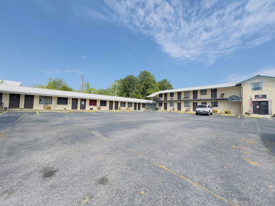 Located on Main Street in the small town of Melbourne, Arkansas, the DenMill Cedar Lodge offers a prime opportunity for investment or business.  This 5,140 sq. ft. motel is well-known in the community and sits in a convenient, visible location. The property includes 17 total rooms, with 4 rooms designated for long-term rentals and 11 rooms available for nightly stays, providing flexibility and consistent income potential.  With its established name and central placement in Melbourne, this lodge combines small-town charm with practical lodging options for both residents and visitors. Priced to sell at $389,900.