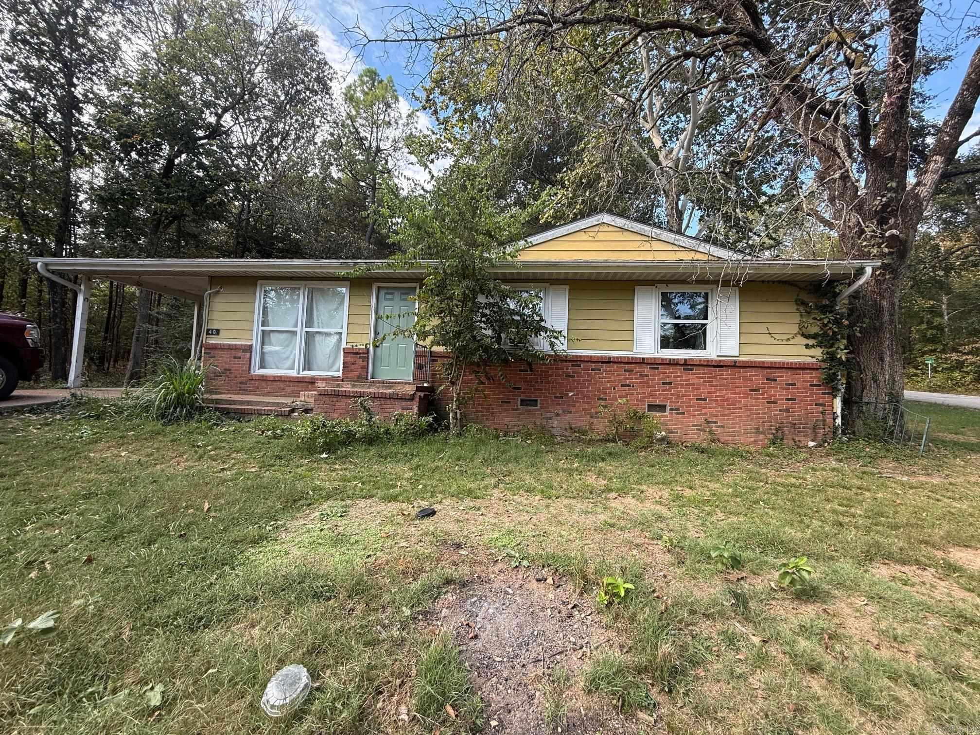 This 3-bedroom, 2-bath home sits on a large corner lot and offers tons of potential. Ideal for investors or buyers wanting to add their personal touch and make it their own. Conveniently located near the golf course and just minutes from all the fun and entertainment Cherokee Village has to offer.