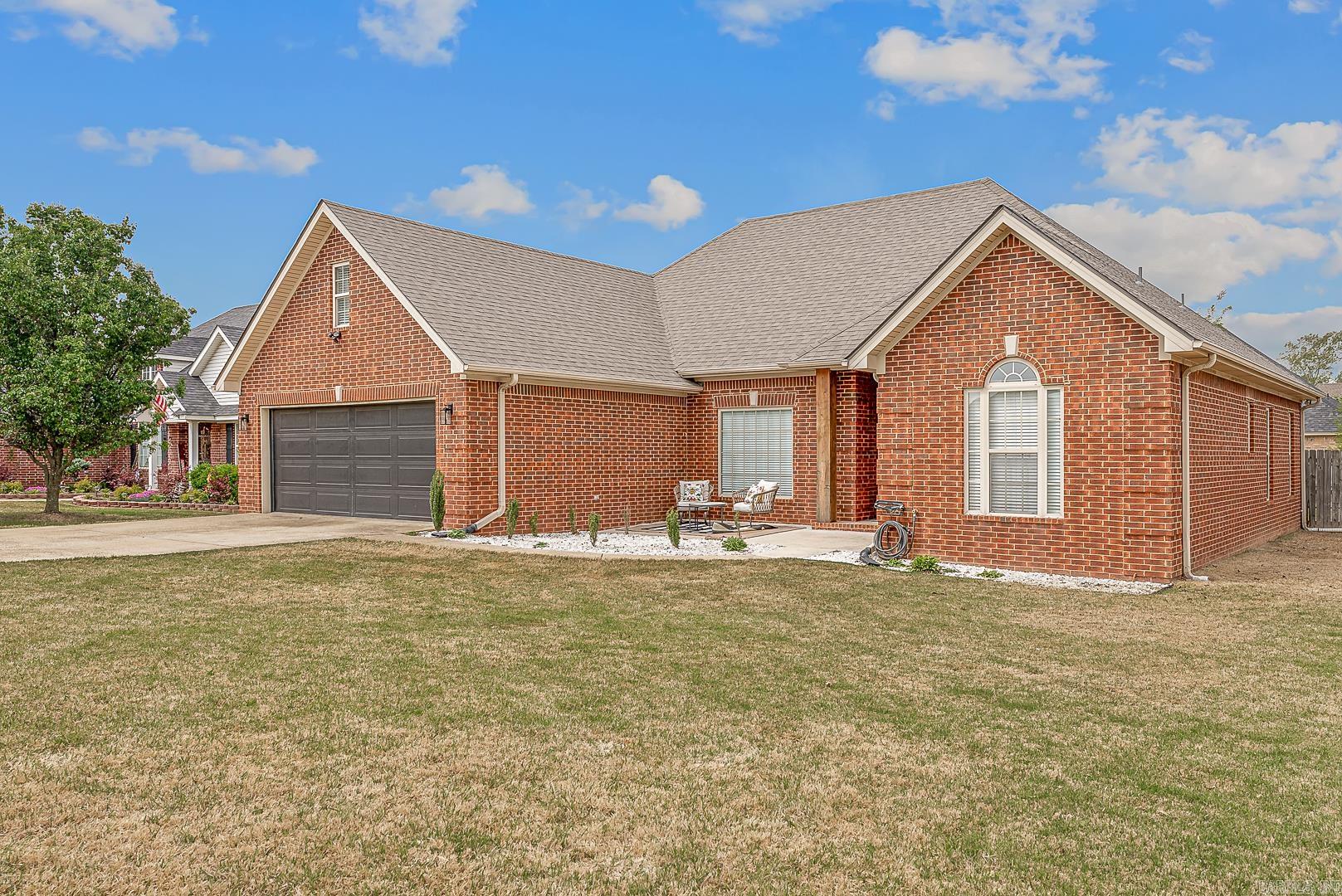 Welcome to 5517 Timber Creek Lane of Southbend Subdivision in Jonesboro, Arkansas! BACK and better than ever - NEW roof and NEW HVAC system! This classic beauty with modern flare features four large bedrooms with large closets, two full bathrooms, boasting over 2500sqft with gorgeous neutral interior design color trends. The open-concept living/dining space paired with split floorplan bedroom layout creates the perfect blend of shared space with coveted privacy. With custom upgrades throughout, this home is sure to wow your guests at your next holiday party or game night! No details were spared in creating the perfect home for entertainment, both indoor and outdoor. Updates such as the front porch extension, the pergola over the back patio, and even the bonfire pit, create the perfect ambiance to enjoy a sit and sip and yap the days away. This home has endless opportunities to create the happiest of memories for years to come! If you crave class blended with modern luxury, conveniently nestled in the melting pot of subdivisions in the highly sought after south side of Jonesboro, here it is! Call your favorite agent today to schedule a private tour!