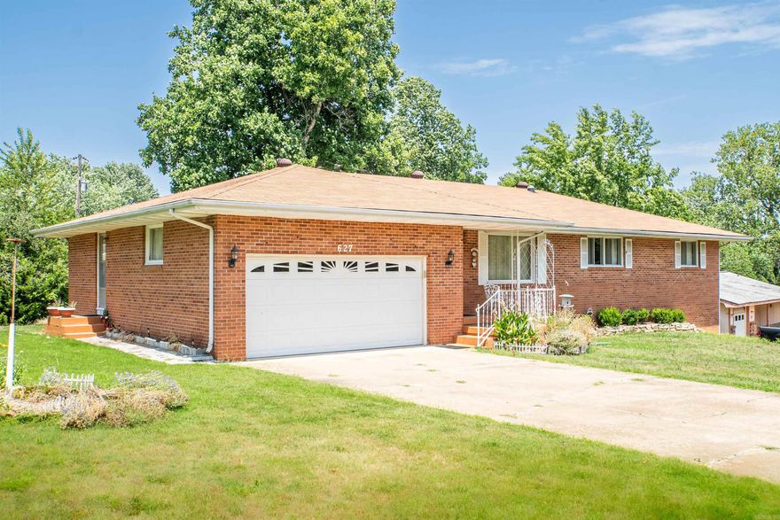 Nice three bedroom, 2 bath all brick house on nice corner lot.  This house is ready to move in and has a full basement that is ready to finish.  The basement has a drive-in door for your lawn mower and tools, plus a nice workshop area.  An additional shower is in the basement as well.  Upstairs the open kitchen and dining area make for a great place to entertain guests and family.  The nice sized utility comes with a wall mounted ironing board and plenty of storage.  The heated and cooled sunroom make for a peaceful place to relax and drink that morning coffee.  You’ve been looking for a new place to live, this house is just 2 blocks from Baxter Hospital and is central to everything.  Close to two lakes and rivers, make it yours.