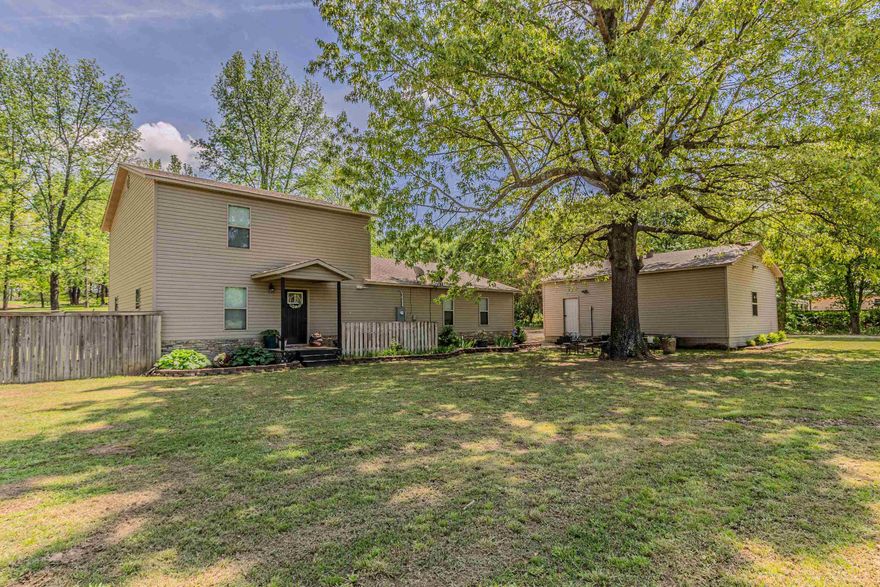 This one owner home sits on 1 acre in a sought after location, nestled near cornbread corner with lots of elbow room. Featuring 3 bedrooms, 2.5 bathrooms, an office (or 4th bedroom), 2 living spaces, a spacious kitchen with ample counter space, separate dining space and breakfast nook, large laundry and a super fun put-put golf area that can be easily moved if you prefer! (it was made to just sit in that space)  When you have had your share of fun inside enjoy the privacy of a fenced in backyard and the versatility of a detached 2 car garage/shop. This house is welcoming and has the character to make it a HOME!