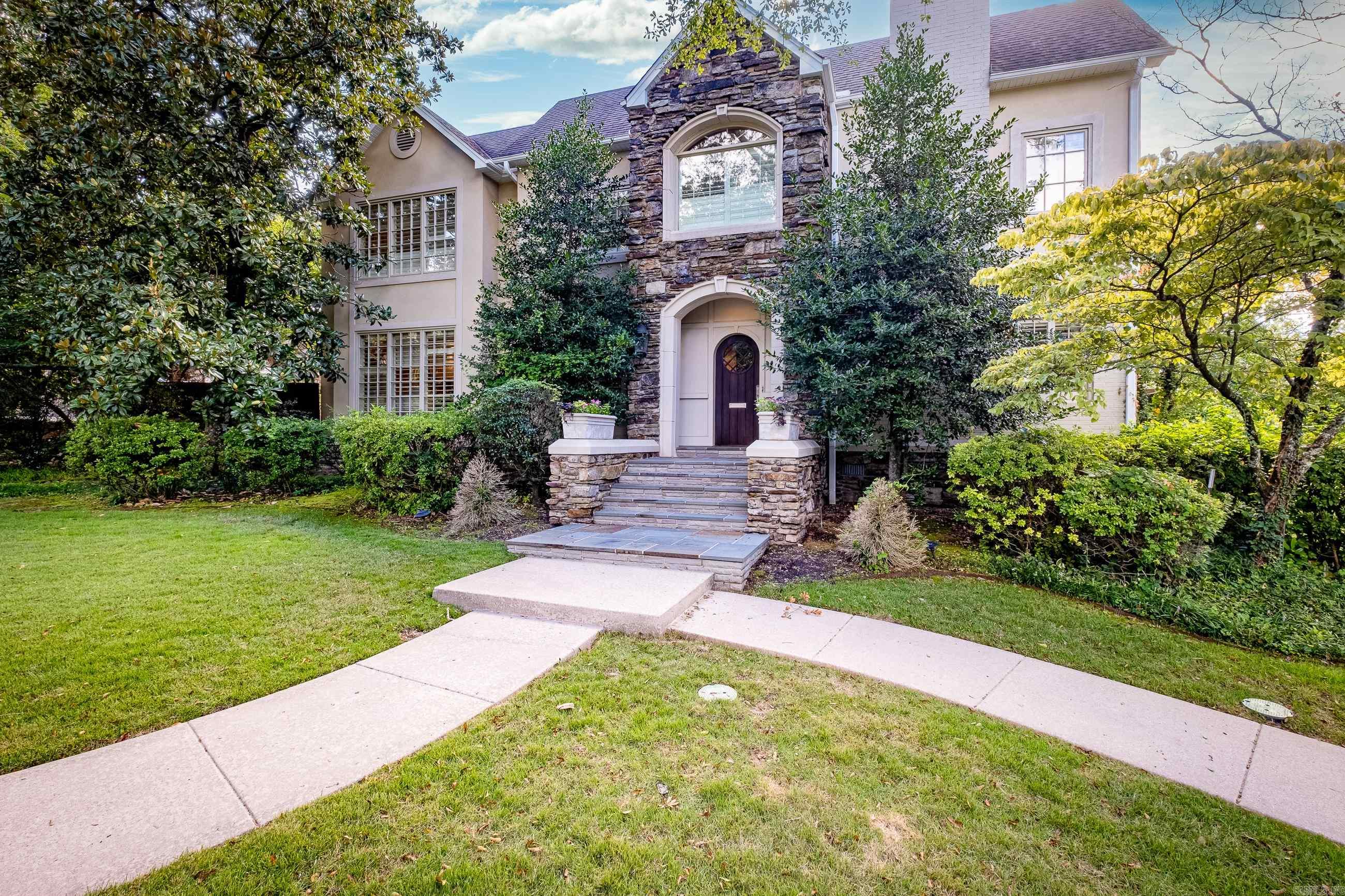 Elegant and timeless traditional 2-story Heights home! Exquisite 1920s design with a classic layout. Lovely, welcoming entry opens to a grand staircase, flanked by a formal living space and a gracious, open den with fireplace, built-ins, and custom ceiling moldings. Well-maintained hardwood floors throughout. Custom bar with 2 oversize wine refrigerators. Handsome formal dining. Clean kitchen design with granite countertops and island with a breakfast bar. Subzero refrigerator, Thermador range and lots of storage! Precious breakfast nook overlooking an outdoor garden/patio. Sunroom adjoins a full size bathroom. 4 bedrooms and 3 full baths up with an open landing and built-ins. Distinguished primary suite with updated bath boasting a soaking tub and walk-in shower. Generous laundry room. Custom wood blinds throughout. 2 car carport with parking pads. So much to see! Time-honored, stunning home 2 blocks from CCLR and close to Heights shops and restaurants. Plans to remodel kitchen, add a garage and a primary suite down will convey at no cost.