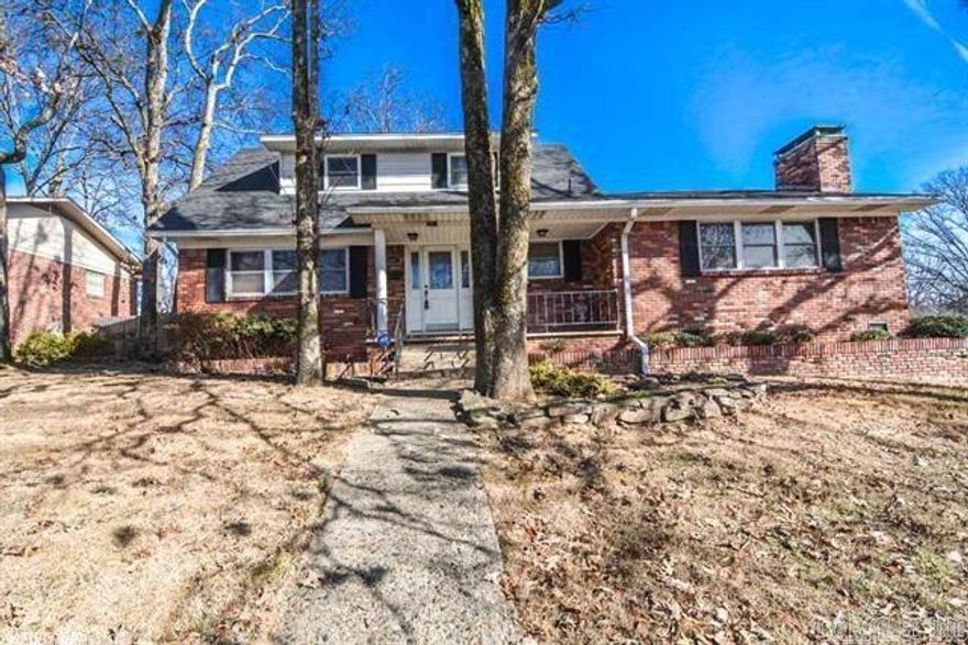 Wonderful family home in Indian Hills subdivision. Close to everything! 2 living areas; 1 w/wood burning fireplace, lots of built in storage & open to kitchen. 2nd living area makes a great playroom or office. Master, on main level, has his/hers closets. Hardwood floors throughout main level living & kitchen. Large laundry doubles as a full bath w/tile shower. 2 car garage and fenced in back yard.