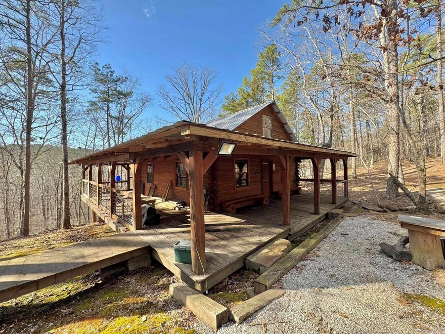 Escape to true off-grid living with this 850 sq. ft. studio-style cabin on 40 acres of pristine timberland. Featuring an open loft and kitchen, this rustic retreat offers a peaceful and private setting with no neighbors in sight, surrounded by timber corporation land. Though there’s no bathroom yet, plumbing is in place for easy installation. The cabin runs on a generator for power, and water is hauled in or can be connected to an outdoor source. Turkey Creek borders the back of the property, just a short 4-wheeler ride away, perfect for recreation and off-grid water access. The land has not been logged according to the owner, offering untouched natural beauty. The cabin can be sold fully furnished, ready for your retreat or homestead. A mobile sawmill is also available, making this a great opportunity for those looking to build or live self-sufficiently. If you're seeking seclusion, freedom, and off-grid potential, this is it. Call today!