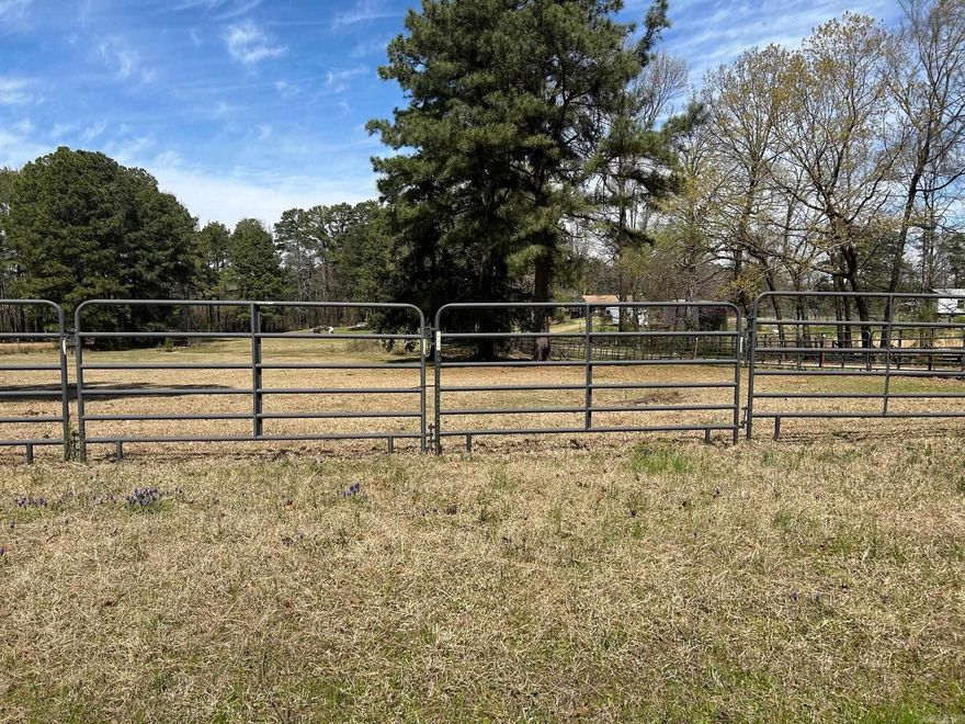 2.3 acres of undeveloped land on a paved road.  Utilities available.  Make a beautiful home site with a creek running through the back or the lot.