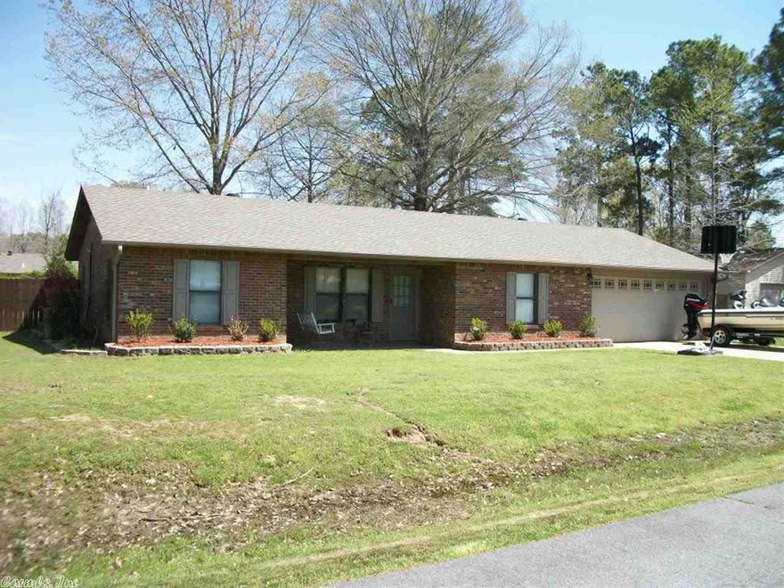 **Wonderful kid friendly neighborhood**A short walk for fishing from the community dock**2013 New Roof**Brick exterior**2 car garage**Interior features lots of updates**2014 new Hardwood in Living and dining areas**2014 Tile in all wet areas**Tile countertops and backsplash**Decorator paint thru-out**Split bedroom plan with spacious master bedroom**Wood burning rock fireplace**Sheridan Schools but only 15 minutes to downtown Little Rock**