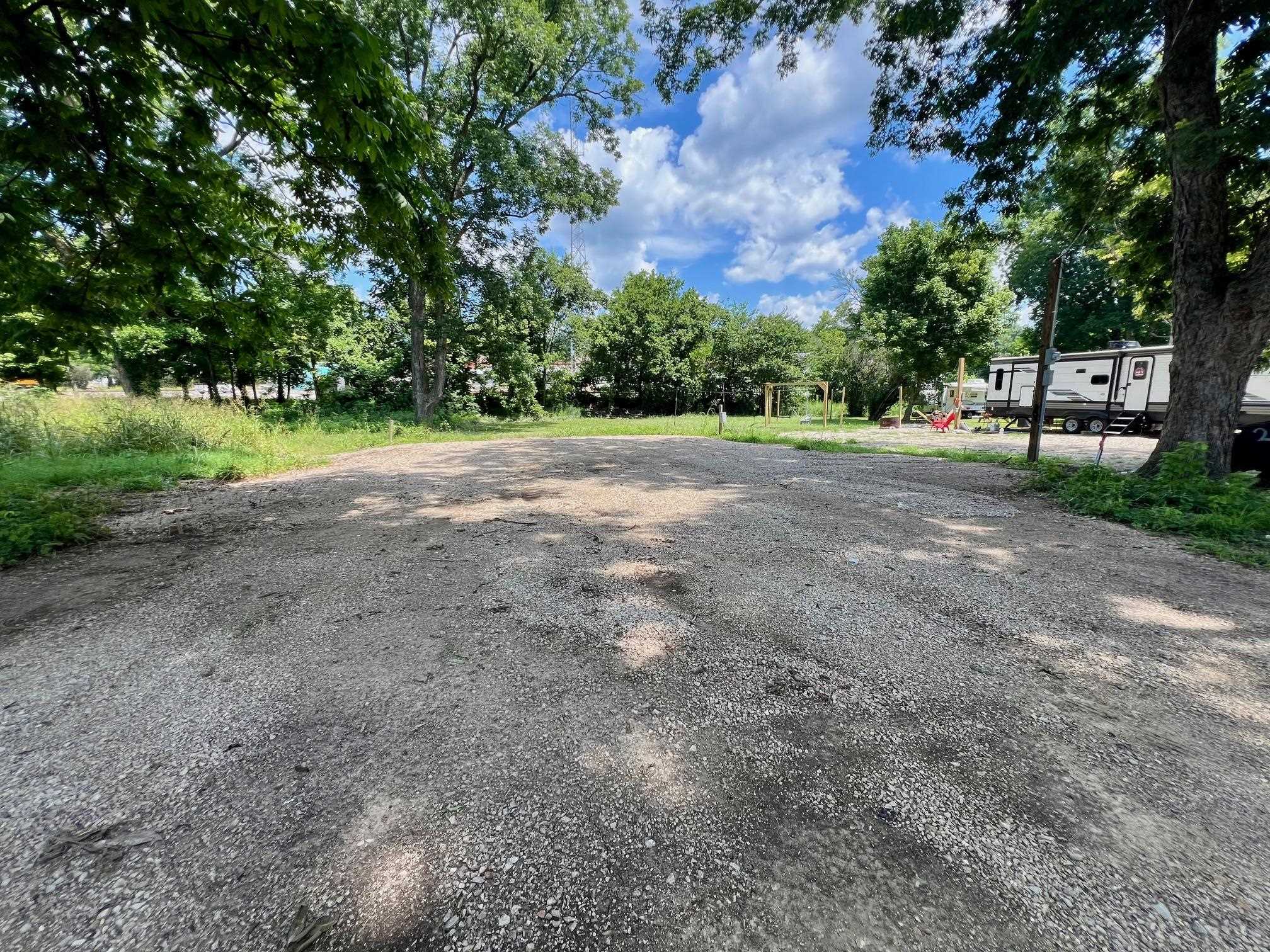 Looking for a peaceful retreat or the perfect spot to build your weekend getaway? This vacant lot sits just across from the scenic Spring River, offering beautiful views and easy access to all the outdoor fun you can handle. Whether you're bringing a camper for summer adventures or planning to build a cozy stilt house, this parcel is ready with public water and sewer connections and electricity available nearby. It's located just minutes from Main Street in Hardy, so you'll be close to shops, dining, and local charmāyes, even coffee for those early fishing mornings. With the river nearby and a relaxed setting, this property makes an excellent candidate for a vacation rental or personal escape. Whether you picture roasting marshmallows by a fire or kayaking at dawn, this spot delivers the kind of relaxed lifestyle that only river living can offer. Bring your blueprints or your camperāeither way, summertime fun is just around the bend.