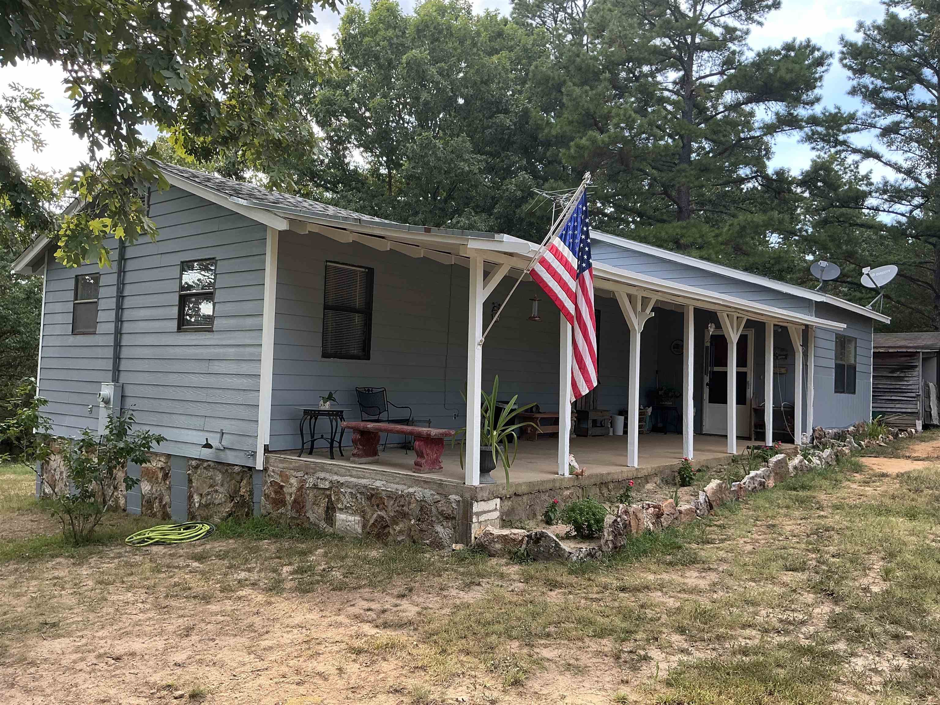 Come check out this beautiful mini-farm nestled in peaceful Poughkeepsie, AR. This property offers mature fruit trees, a versatile barn with loft, large shed with attached enclosed equipment shed, large chicken coup with fenced in run, 2 rabbit hutches, and an extra covered versatile pen for dogs, goats, or whatever. Whether you are an avid hunter or just enjoy watching the wildlife, there is plenty of it here! Deer can be seen almost every evening from the kitchen window and turkeys gobble in the near distance. Inside, the home has 3 bedrooms, large laundry/utility area, handicapped accessible bath tub/shower, hallway shelves, dishwasher, refrigerator, gas stove and gas dryer, and washing machine that all convey. Even though it has a brand new 2.5 ton central heating and air system, it also has back-up ventless gas heaters in the event of a power failure or if you just want that extra boost of heat. This property has so much potential and is mostly fenced. The chickens and rabbits can stay to help get you started. Call today to see this versatile property.