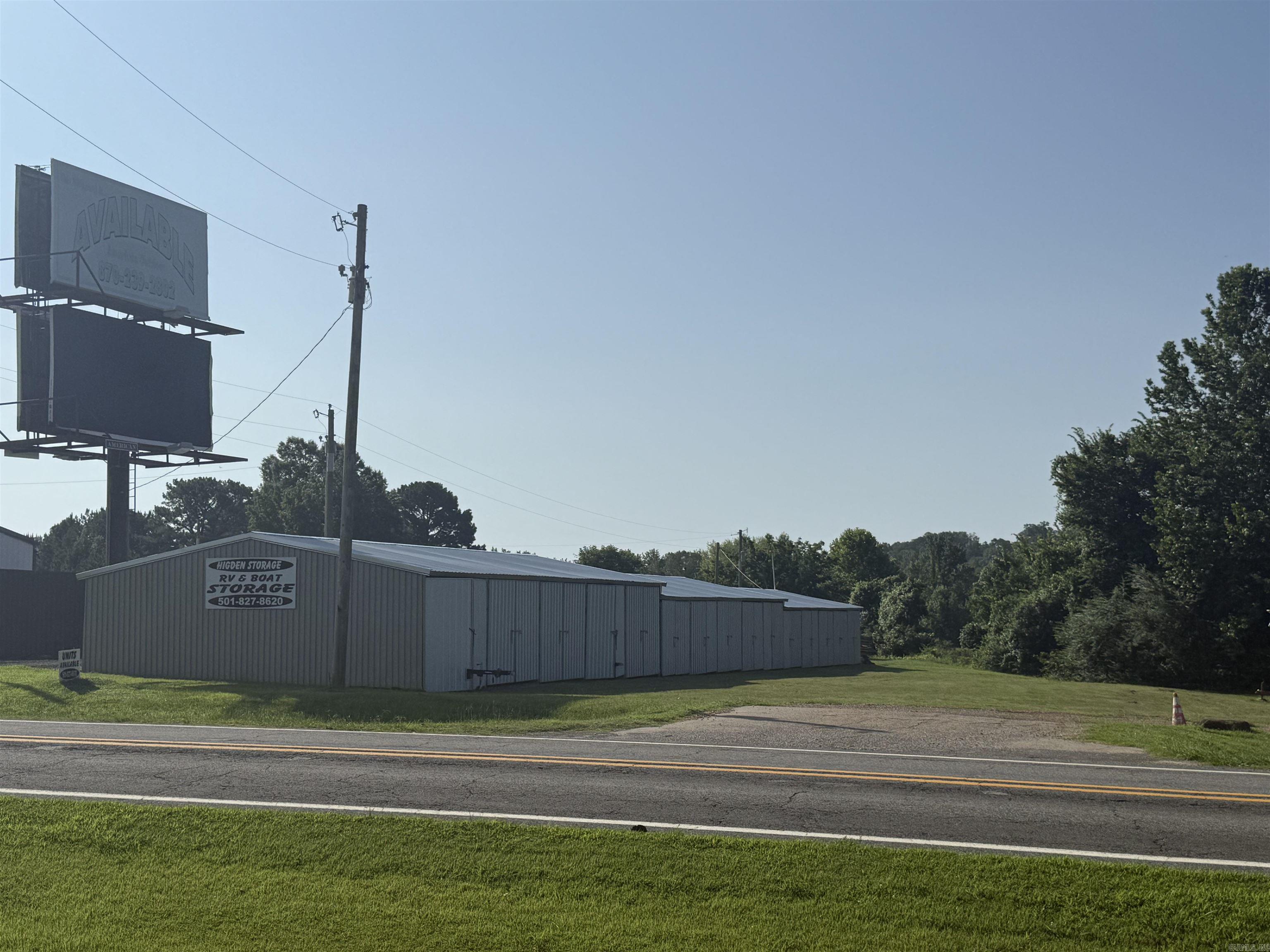 Great investment opportunity! The entire building has a new roof and each unit has new frames and doors. 1 Storage building with 15 units that rent for $450 each per year. Room to expand if the new owner should chose to. The current billboard lease runs thru 2033. It can be renewed and offers an additional revenue stream. Great location with easy access to all the marinas in Greers Ferry/Higden.