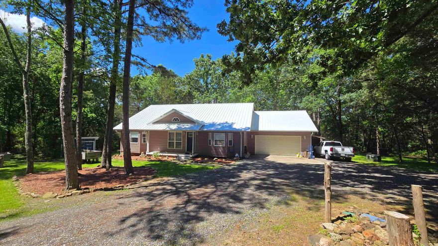 Discover this beautifully remodeled 3-bedroom home, on 5.05 unrestricted acres, featuring a host of new upgrades and modern touches that are sure to impress! Step into the bright, open living spaces with freshly painted walls and trim, complemented by brand-new flooring throughout. The updated kitchen boasts sleek new stainless steel appliances, a large stainless sink, and freshly painted cabinets, paired perfectly with new countertops to create a stylish and functional space. Enjoy the outdoors with freshly painted front and back patios, as well as a brand-new rear deck – perfect for entertaining or relaxing. Additional updates include new light fixtures and ceiling fans for a refreshed, modern feel. The HVAC system has been regularly serviced, ensuring comfort and efficiency year-round.  Don’t miss the opportunity to own this move-in-ready home with high-quality finishes and thoughtful updates throughout!