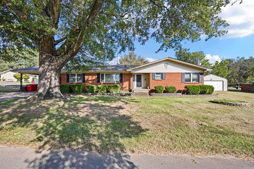 Nestled in a quiet, convenient neighborhood central to Morrilton, this beautifully maintained brick home blends classic character with thoughtful updates. Inside, you’ll find freshly painted interiors and beautifully refinished original hardwood floors that bring warmth and charm to every room.  The home features a great layout designed for comfortable living, along with recent upgrades including a roof that’s less than two years old, a new water heater, and a new dishwasher. Enjoy the outdoors year-round from the inviting screened-in porch, or make the most of the fully fenced backyard complete with a storage shop—perfect for hobbies or extra space.  A covered carport with additional storage adds convenience and function. Move-in ready and full of charm, this home offers the perfect mix of comfort, updates, and small-town appeal.
