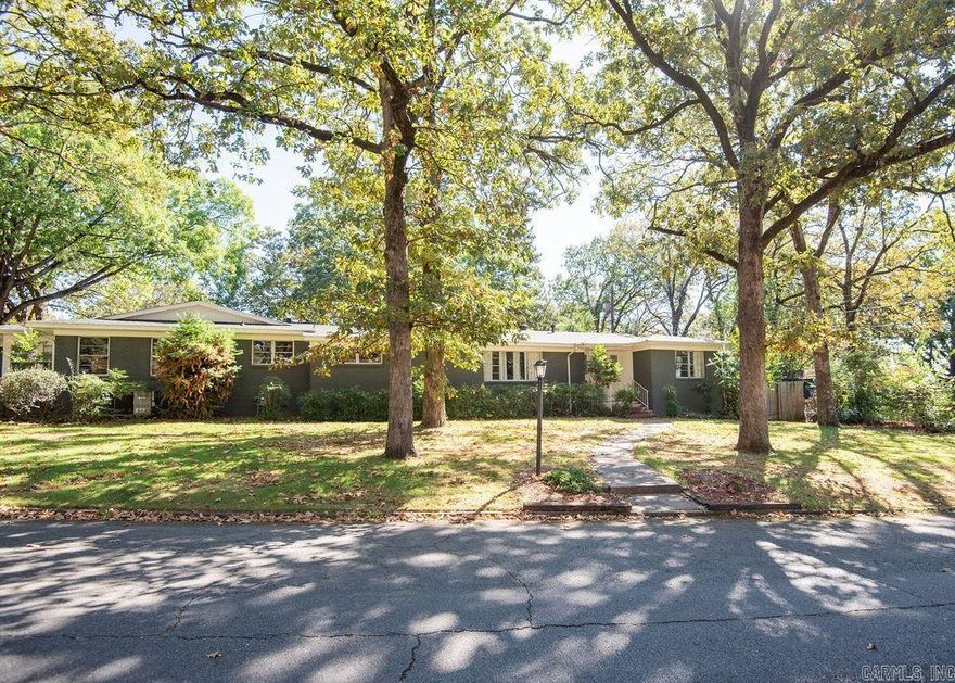 This spacious  3-bedroom, 3-bathroom home  is a true Park Hill gem, located on a corner lot that offers city views.The house features two inviting living rooms, providing you with plenty of space to entertain guests, relax with your family, or create versatile living areas to suit your needs. Refinished hardwood flooring, an abundant amount of storage space, new roof in 2021. This home is a perfect blend of functionality, style, and location!