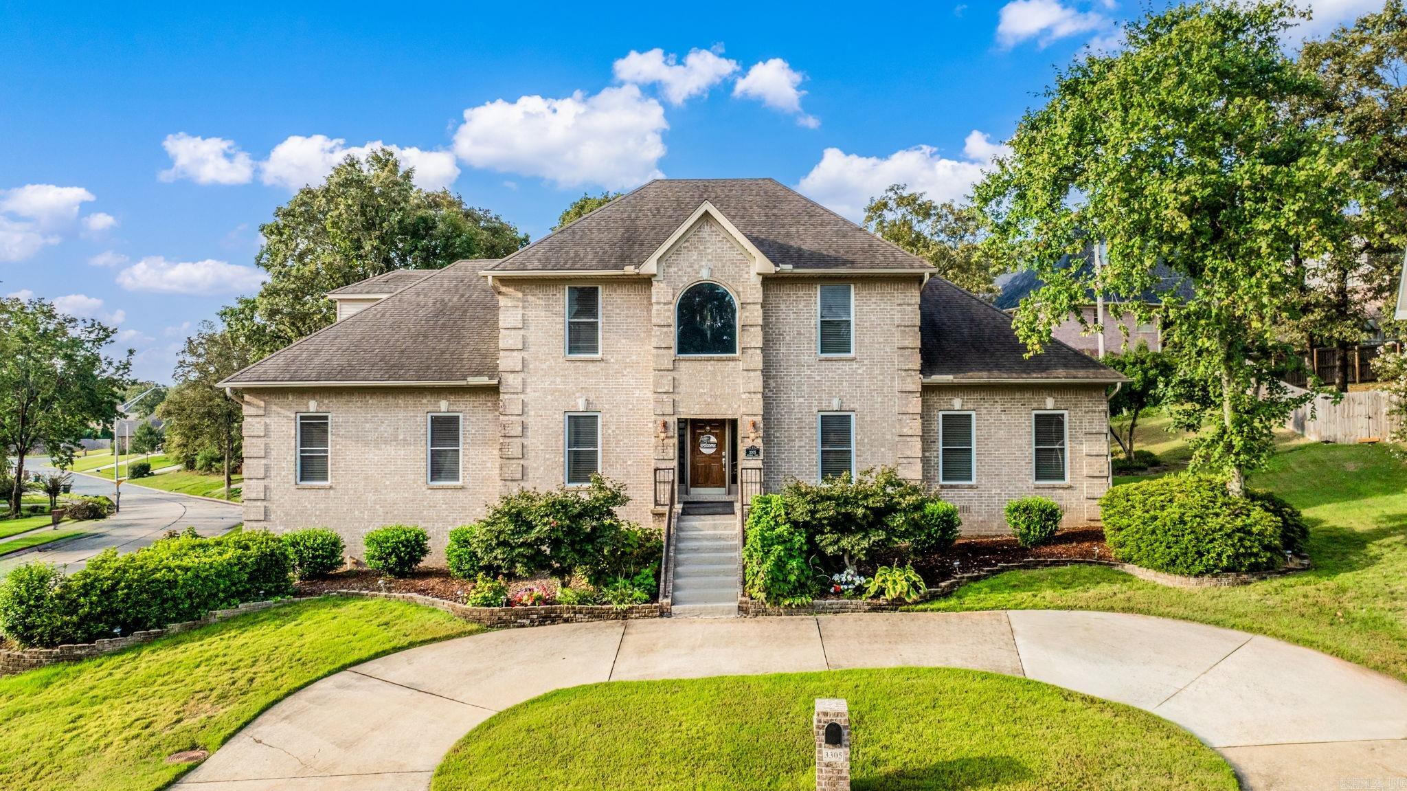 Experience the perfect blend of luxury, comfort, & convenience in this custom-built home designed to rival todayās new builds with its elegant crown molding, soaring ceilings, open floorplan, & countless updates. Priced below recent appraisal! Perfectly positioned at the Sherwood/North Little Rock line, this home offers the best of both worlds. Step inside to discover a grand main level featuring a formal dining room, huge updated eat-in kitchen with quartz countertops, double ovens, & a new built-in ice makerāall opening seamlessly to a spacious living room w/FP. There is a convenient half bath. The main-level primary suite is a true retreat with a spa-like bath & his-and-her walk-in closets. The laundry room doubles as a craft or hobby space. Upstairs is a second primary suite with its own bath & walk-in closet, plus two other large bedrooms, a third full bath, & a massive game room. Enjoy the outdoors on the covered deck and firepit. Other amenities include beautiful hardwoods, 3 car garage, sprinkler & alarm systems, central vac, 75 gallon HWH, circle drive in front, walk-in attic storage and under the house storage room. Located in sought after Overbrook Subdivision.