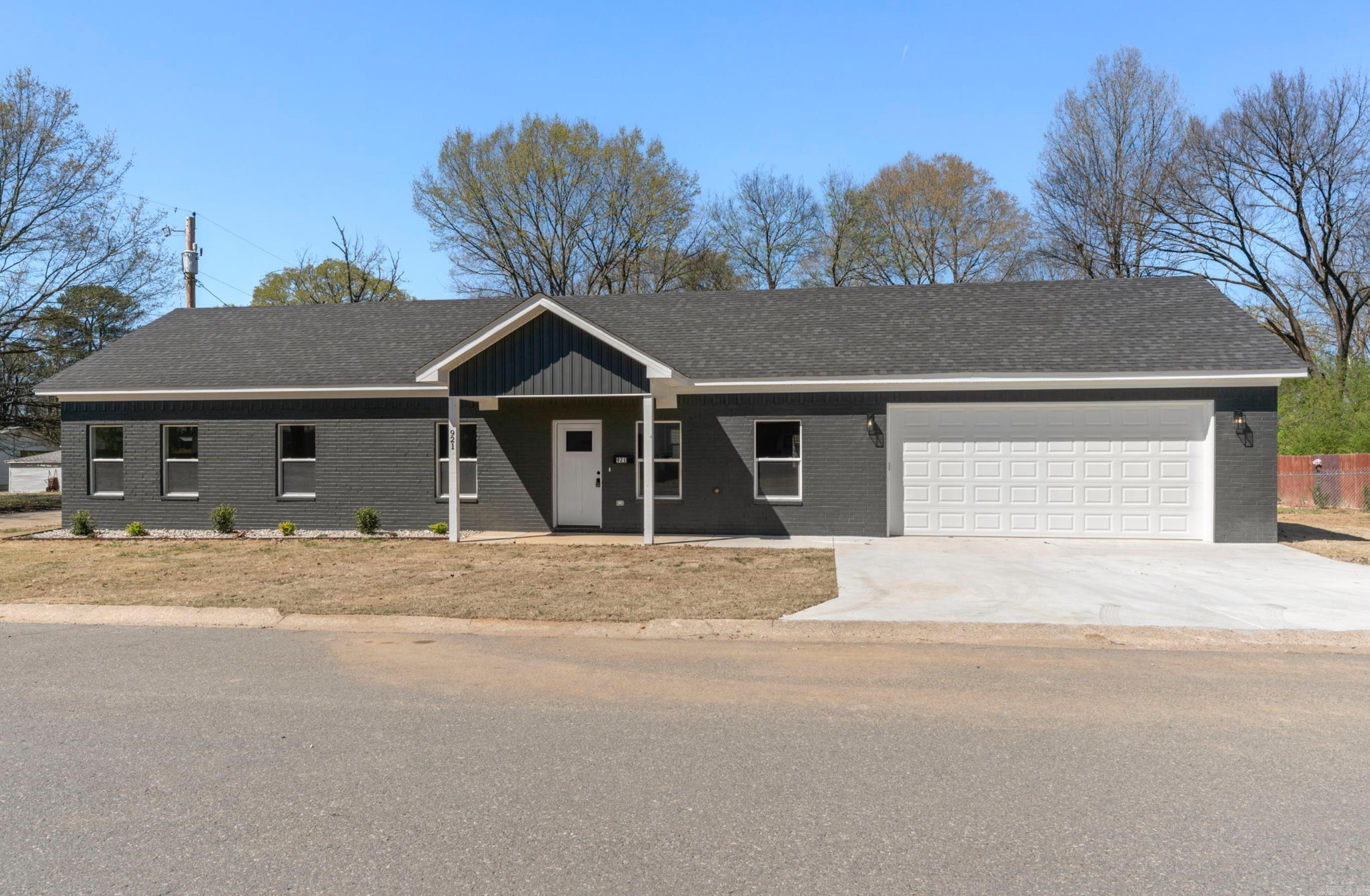 Now Leasing! Gorgeous New Construction Home in the Heart of Benton Looking for a beautiful place to call home? This stunning, quality-built ranch-style home is now available for rent in one of Benton’s most convenient and family-friendly neighborhoods—just minutes from Riverside Park and the Boys & Girls Club! Enjoy the comfort of three spacious bedrooms, two full bathrooms, and a two-car garage—perfect for modern living. The open-concept layout offers a giant living and dining space with easy access to the backyard, ideal for family fun and entertaining. The stylish kitchen is a chef’s dream, featuring stainless steel appliances, a huge pantry, Quartz countertops, a tile backsplash, and an elegant accent wall surrounding an electric fireplace—perfect for cozy nights in. A covered front porch completes the charm of this quiet neighborhood gem. Don’t miss your chance to live in a brand-new home with high-end finishes in a prime location. Schedule your tour today!