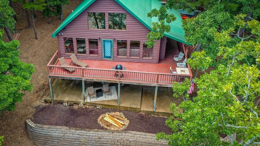 This charming lakefront property is the perfect retreat for anyone looking to escape the hustle and bustle of everyday life. With a cozy loft, two bedrooms, and a spacious deck overlooking Greers Ferry Lake, you'll feel like you're on vacation every day. Plus, with 2 acres of land to explore and easy access to the water, you'll never run out of things to do. Don't miss out on this opportunity to make this peaceful oasis your new home. Contact us today to schedule a showing! Had to change address. County informed me its 1022 and not 922. AR County data is incorrect and they have sent it over to be changed. See AGENT REMARKS!!