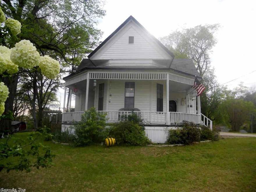This lovely Victorian home takes you back to a time when things were simpler.  It sits on 1.2 acres in the heart of Amity.  The main house has 2 bedrooms with high ceilings, 1.5 baths, and a modernized kitchen.  The guest house can be used as a rental property and has 1 bedroom, 1 bath, and its own kitchen.  Sit on the porch or in the swing and admire the peaceful beauty of the well-cared for yard with the dogwood tree, Japanese snowball trees, azaleas, and many flowers!