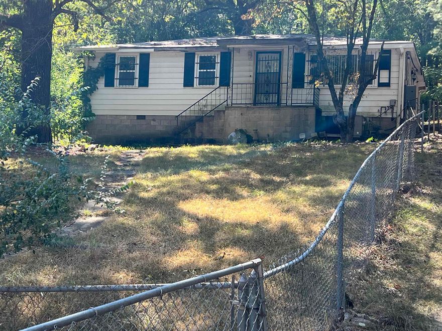 Discover the potential of this three bedroom, one and half bath home. Perfectly situated in the heart of downtown Hot Springs. This property offers several opportunities, whether you are looking to transform it into a rental or take on a flip project. Prime location with endless possibilities.