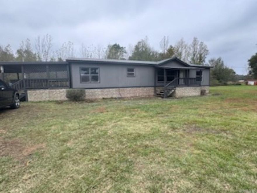 3 bedroom 2 bath located in Harmony Grove with 1624 sq. feet The property boasts a 322 sq ft under-roof porch and a single carport. It sits on a nice corner lot spanning .91 acres. Storage shed does not convey.