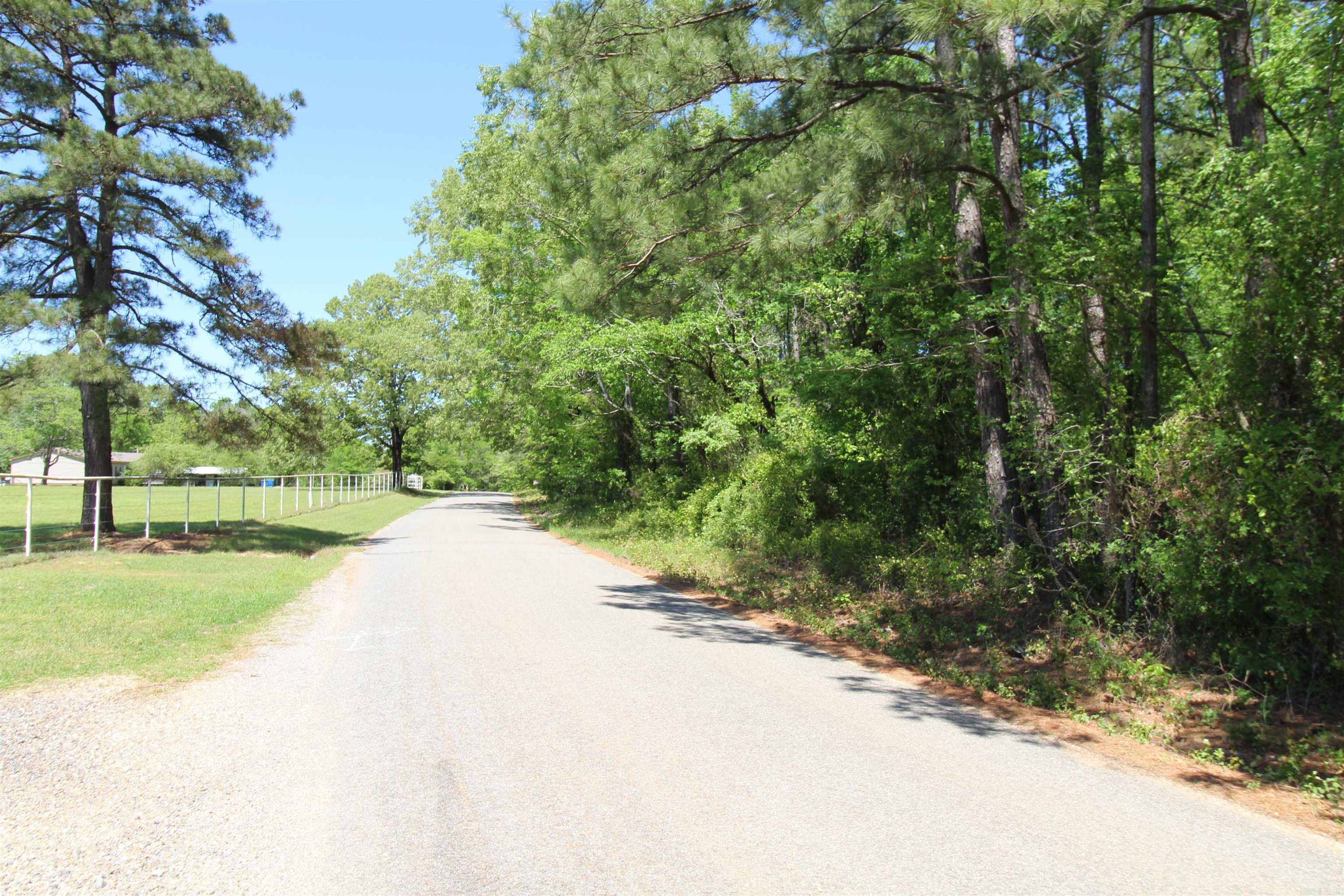 6.99 acres on Grant 68*more acreage available if needed*this property has a water meter already and has a preliminary perc*no restrictions*mobile homes and livestock allowed*survey under ls docs*Sheridan Schools*