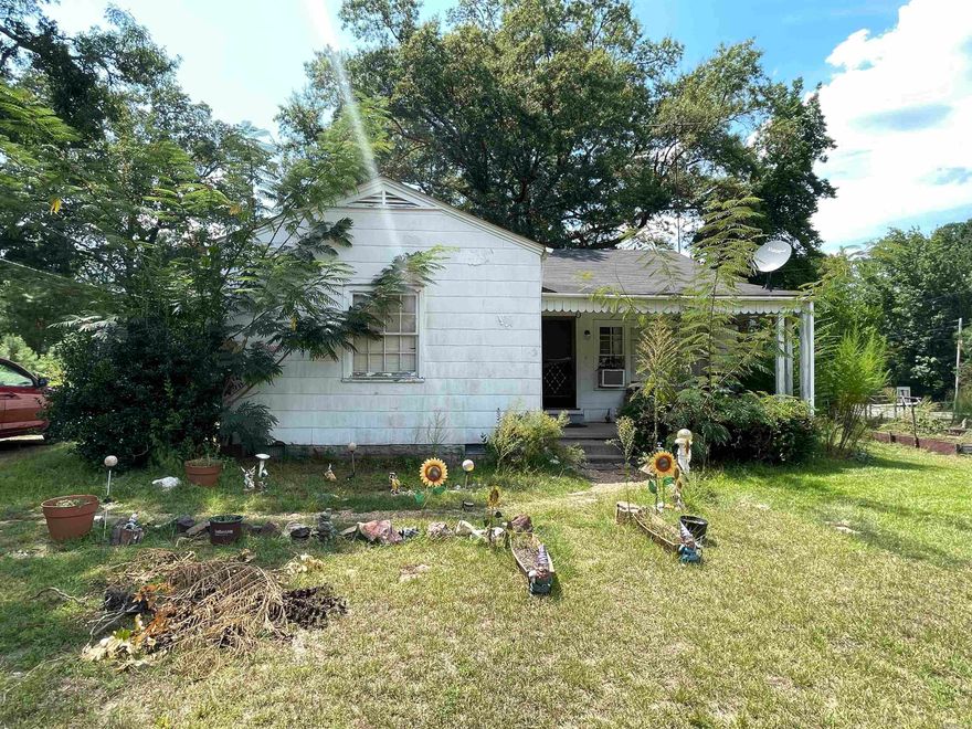 Opportunity awaits with this diamond in the rough! Situated on over 2 acres of land, this property offers the perfect canvas for your vision. Whether you're an investor, builder, or homeowner looking to create your next retreat, the possibilities are endless.  The home needs work but offers solid bones and a layout full of potential. With plenty of space to expand, garden, or even add outbuildings, you'll love the freedom and privacy this large lot provides.  Get a head start with new gas stove and stainless steel fridge!  Located in a peaceful setting yet conveniently close to town, this is your chance to turn a fixer-upper into something truly special. Bring your tools and imagination—this one won't last