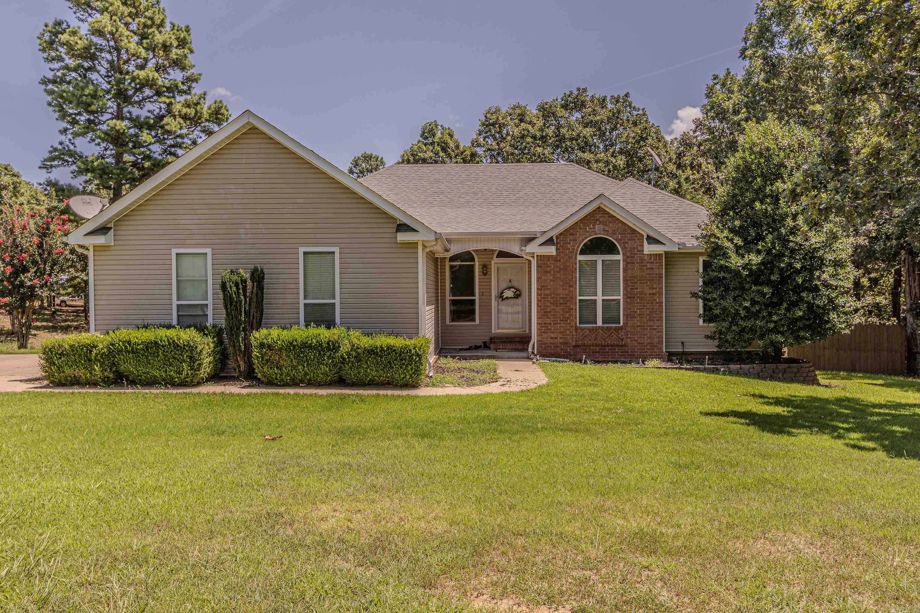 Charming 4-Bedroom Home on 4 Acres with Bonus Room, Outdoor Fireplace & Shop Set on 4.02 beautifully maintained acres just outside of town, this thoughtfully updated 4-bedroom, 3-bath home offers space, comfort, and timeless appeal. Upstairs, youāll find an open-concept layout with an updated kitchen, inviting living and dining areas, and three bedrooms with two full baths. The home has been tastefully updated throughout, blending modern touches with classic style. Downstairs features a spacious bonus room, ideal for entertaining, complete with a slate pool table, bar, entertainment center, and seatingāall of which convey with the home. An additional bedroom, full bath, and kitchenette on the lower level provide flexible living options for guests or extended family. Outdoors, enjoy peaceful mornings and relaxing evenings under the pergola beside a beautiful brick fireplaceāperfect for year-round enjoyment. A 40x30 (1,200 sq ft) heated and cooled shop with electricity offers exceptional space for hobbies, storage, or workspace. With its serene setting, generous living space, and thoughtful updates, this property offers the best of both comfort and convenience!