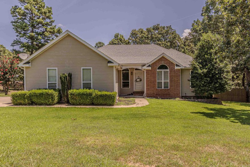 Charming 4-Bedroom Home on 4 Acres with Bonus Room, Outdoor Fireplace & Shop Set on 4.02 beautifully maintained acres just outside of town, this thoughtfully updated 4-bedroom, 3-bath home offers space, comfort, and timeless appeal. Upstairs, you’ll find an open-concept layout with an updated kitchen, inviting living and dining areas, and three bedrooms with two full baths. The home has been tastefully updated throughout, blending modern touches with classic style. Downstairs features a spacious bonus room, ideal for entertaining, complete with a slate pool table, bar, entertainment center, and seating—all of which convey with the home. An additional bedroom, full bath, and kitchenette on the lower level provide flexible living options for guests or extended family. Outdoors, enjoy peaceful mornings and relaxing evenings under the pergola beside a beautiful brick fireplace—perfect for year-round enjoyment. A 40x30 (1,200 sq ft) heated and cooled shop with electricity offers exceptional space for hobbies, storage, or workspace. With its serene setting, generous living space, and thoughtful updates, this property offers the best of both comfort and convenience!