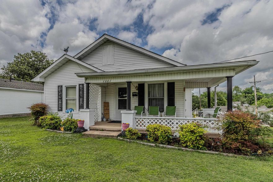 Welcome home to this charming corner-lot gem that’s full of character and thoughtful updates! Enjoy relaxing mornings or evening chats on the inviting front porch. Outside, you’ll find a separate shop with electric—perfect for hobbies, storage, or weekend projects—plus a one-car garage with an attached lean-to for even more covered space. Inside, the home features a spacious formal living room, a dedicated formal dining area, and a large kitchen that’s ready for all your cooking adventures. Just off the mudroom is an underground storage space currently used as a storm shelter, offering both convenience and peace of mind. Recent updates include a brand new roof, new gas water heater, and a new gas stove. The yard has been freshly manicured, making this home feel just as good on the outside as it does inside. Move-in ready and waiting for you!