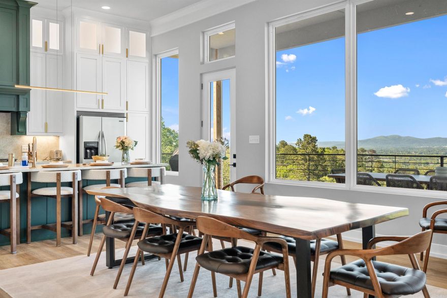 Offering Sweeping Views of the City, Ouachita Mountain Range and Lake Hamilton... Situated on a One Acre Lot on Mt. Riante, this Gorgeous Home is Offered Fully Furnished! Enjoy an Open Floor Plan with 12' Ceilings and Walls of Windows that Highlight the Mesmerizing Views! The Chef's Kitchen features Floor to Ceiling Cabinetry, and a Huge Island with Seating for 4... while the Wet Bar (with Wine Fridge) Compliments the Large Dining Space - Perfect for Sharing Meals with Family & Friends. The Large Great Room is the Heart of the Home! The Bedrooms are Stunning, each featuring Mountain Views. The Lower Level Living Area/ Game Room is Fun for Kids and Adults Alike! This is the Ultimate Entertainer's Home! Dine Alfresco on the Upper and Lower Patios, Soak in the Hot Tub, Gather Around the Custom Fire Pit or Relax in the Brand New Pool! Schedule a Showing Today to See this GEM!!