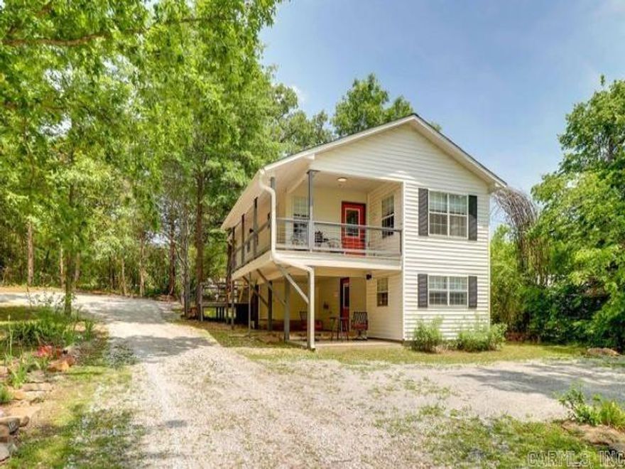 Two story house is set up as a VRBO. Downstairs there is a studio apartment and two storage compartments. Upstairs the is two bedrooms, den, kitchen, bathroom, stacked washer/dryer and a dining area. This house comes completely furnished with everything you need to start renting it out. There is a covered sitting area downstairs and a covered porch upstairs to sit and enjoy the day. There are two firepits for your clients to enjoy. There has been several updates including a new roof and new siding. All of this is located just a short distance to everything downtown Mountain View has to offer. Give us a call today and get your next adventure started.