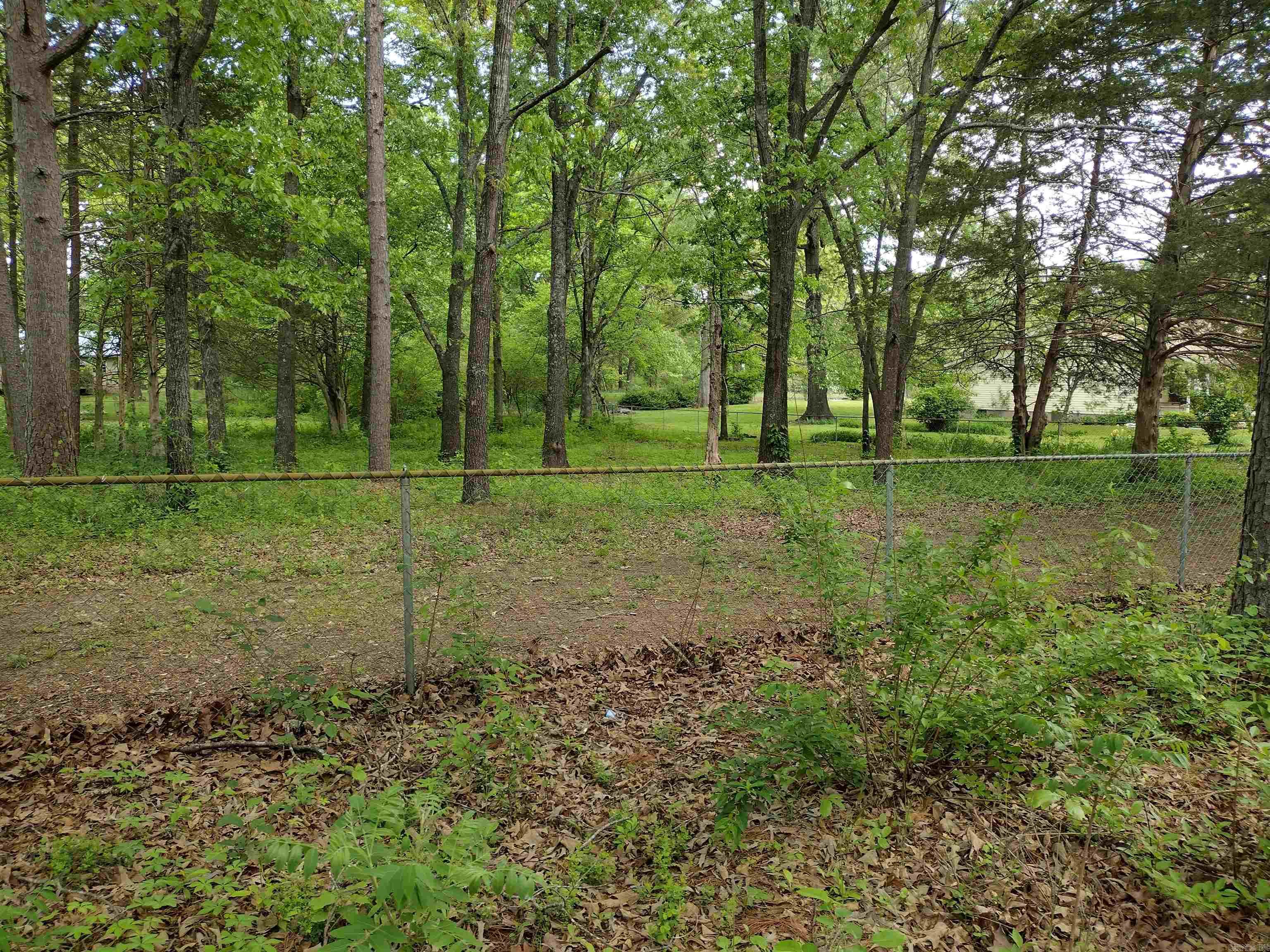 Nice subdivision lot large trees not far from town great place to build your new home