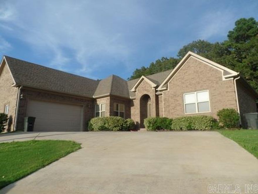 Large split floor plan With the huge master bedroom suite, Jetted tub, walk-in shower, double vanities, built-ins in master closet. Kitchen  has stained cabinets, granite counter tops, hardwood floors, formal dining room, tray ceilings, gas log fireplace, lots of character with the crown molding. Big back yard with green space behind and  a great covered porch.Sq Ft approx. Measuring encouraged